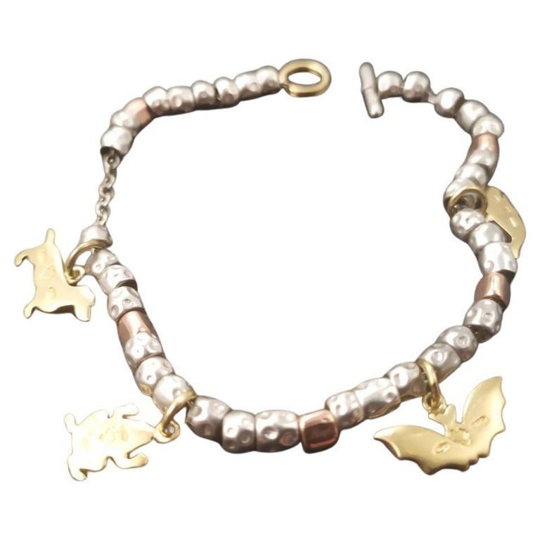 Pomellato DoDo gold and silver bracelet For Sale at 1stDibs | pomellato  silver bracelet, dodo cord bracelet, pomellato bracelet dodo