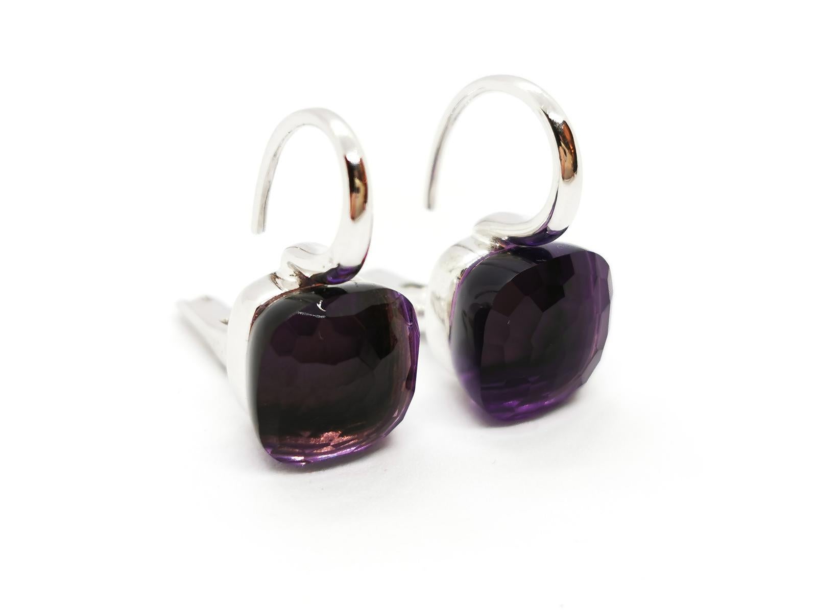 Earrings signed by the house Pomellato. Nudo Classic collection. in white gold 750 thousandths (18 carats). set with two amethysts. dimensions: 2 cm x 1.04 cm. total weight: 9.21 g. eagle head hallmark. new price: 4500€. excellent condition

