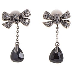 Pomellato Forever 18 Karat White Gold Onyx and Black Diamond Bow Earrings