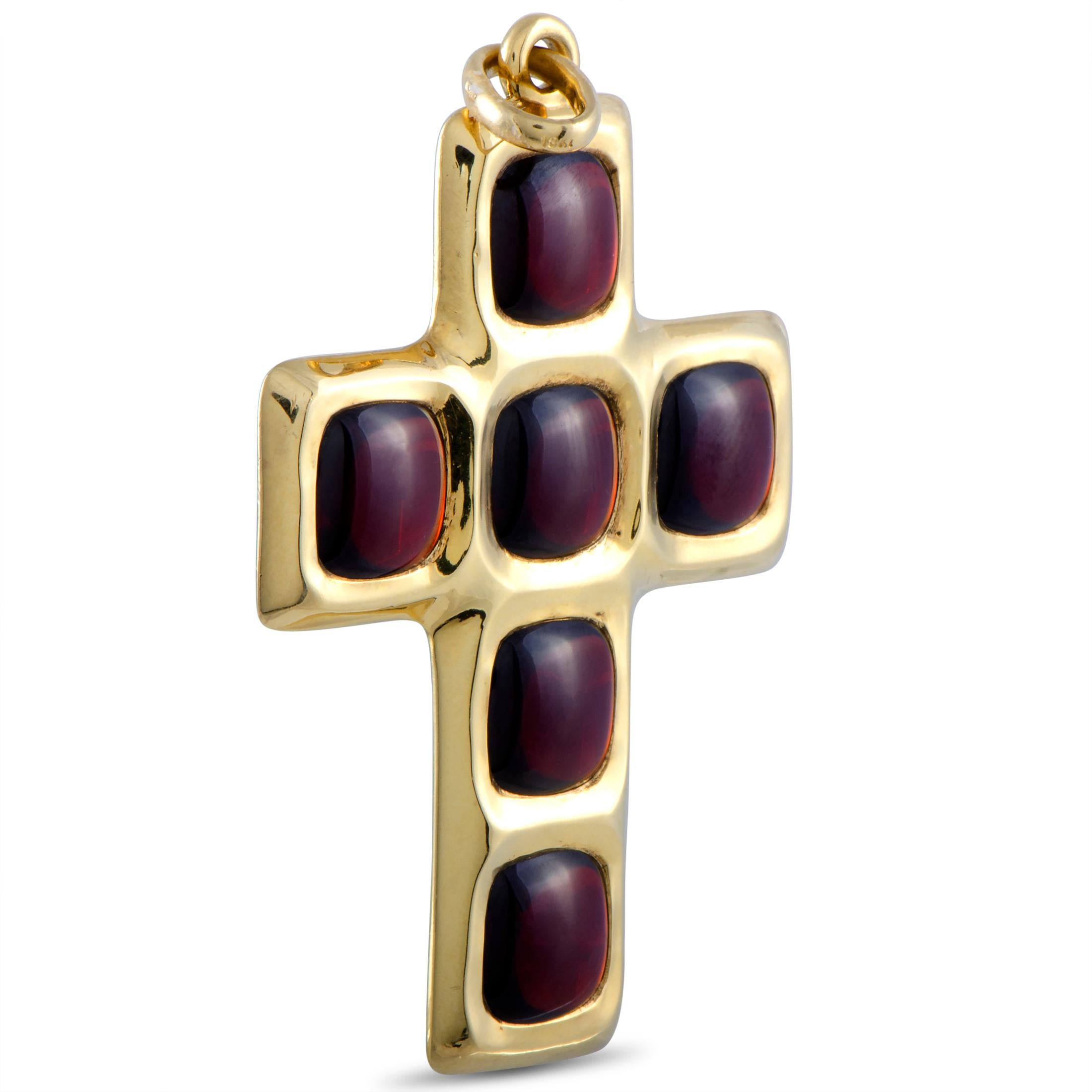This stunning cross pendant is a Pomellato design that combines the luxurious allure of gold with the compelling beauty of the striking garnets. The pendant is expertly crafted from 18K yellow gold and it weighs 30.6 grams.
Included Items: