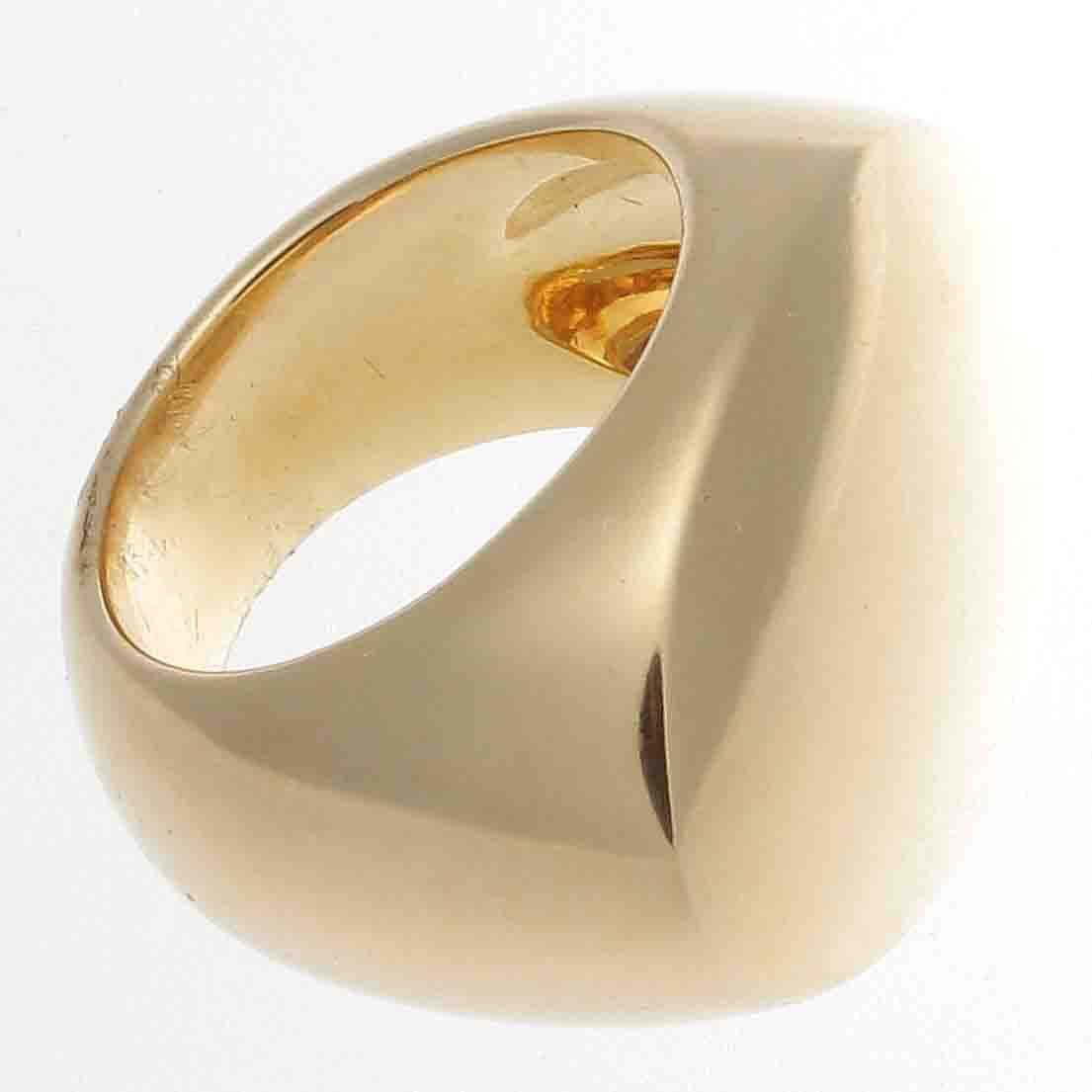 Synonymous with creativity and color, Pomellato's bold trendsetting designs created a new philosophy to the traditionally conservative world of jewelry. Swooping lines of fine Italian 18k gold commence to create this large cocktail ring. Signed