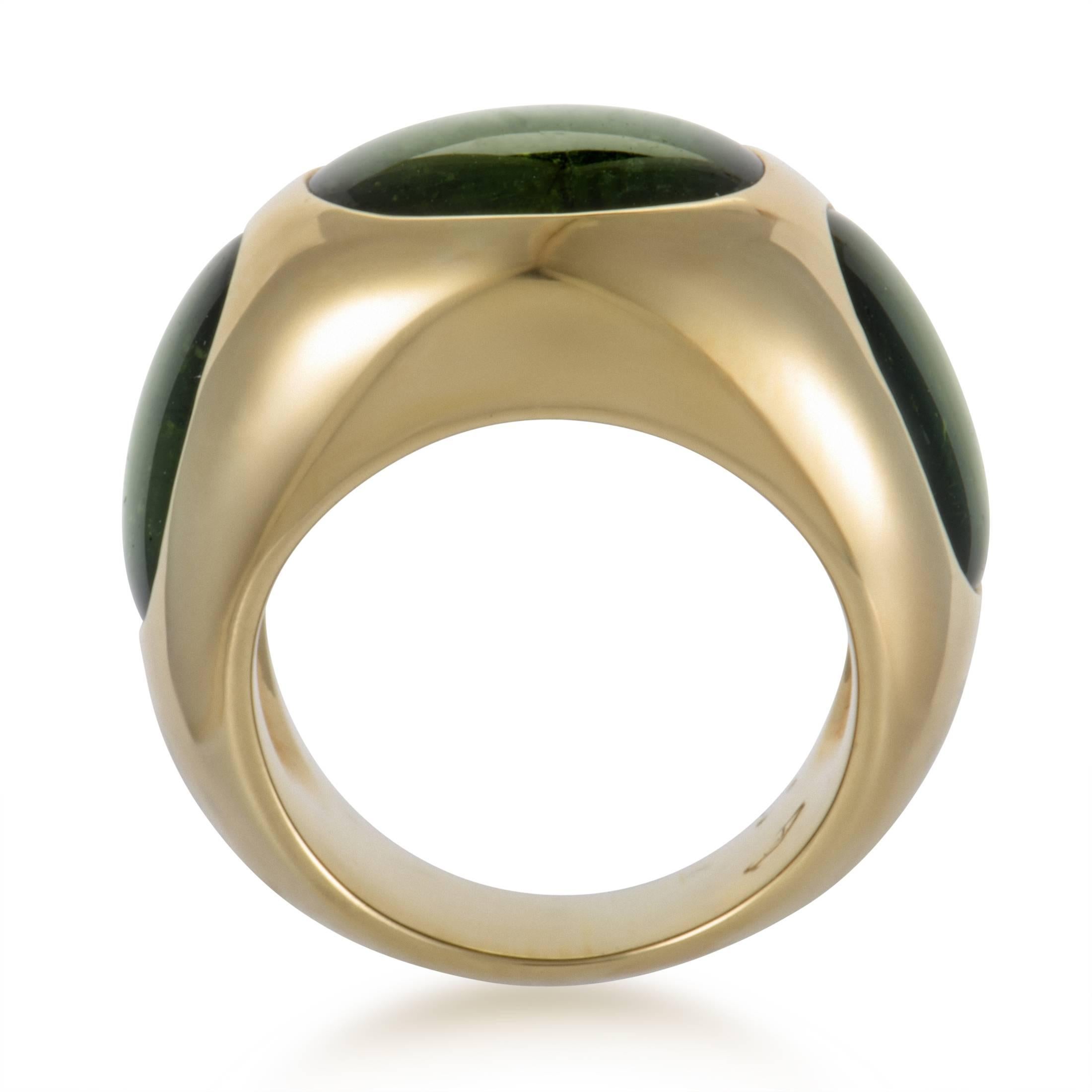 Bold, offbeat design characterizes this statement ring presented by Pomellato that is made of radiant 18K yellow gold and features attractive green tourmalines.
Ring Top Dimensions: 23mm x 15mm
Band Thickness: 10mm
Ring Top Height: 8mm
