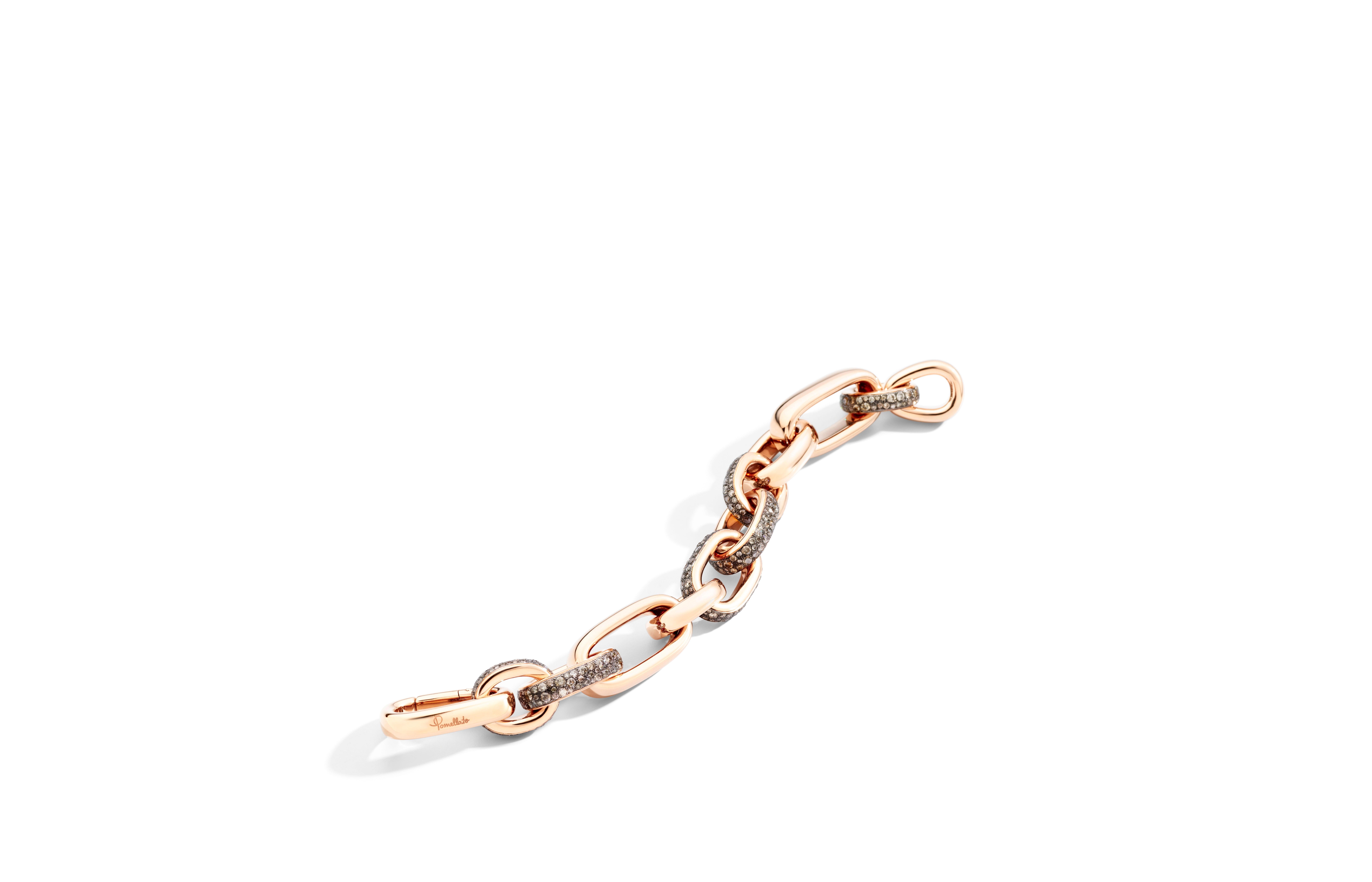 Honoring Pomellato’s goldsmith heritage, ICONICA shines in bold bracelets of sensual rose gold. Daring, lightweight and stackable, this anniversary collection may be mixed-and-matched per the Pomellato spirit. 18k rose gold with pave set brown
