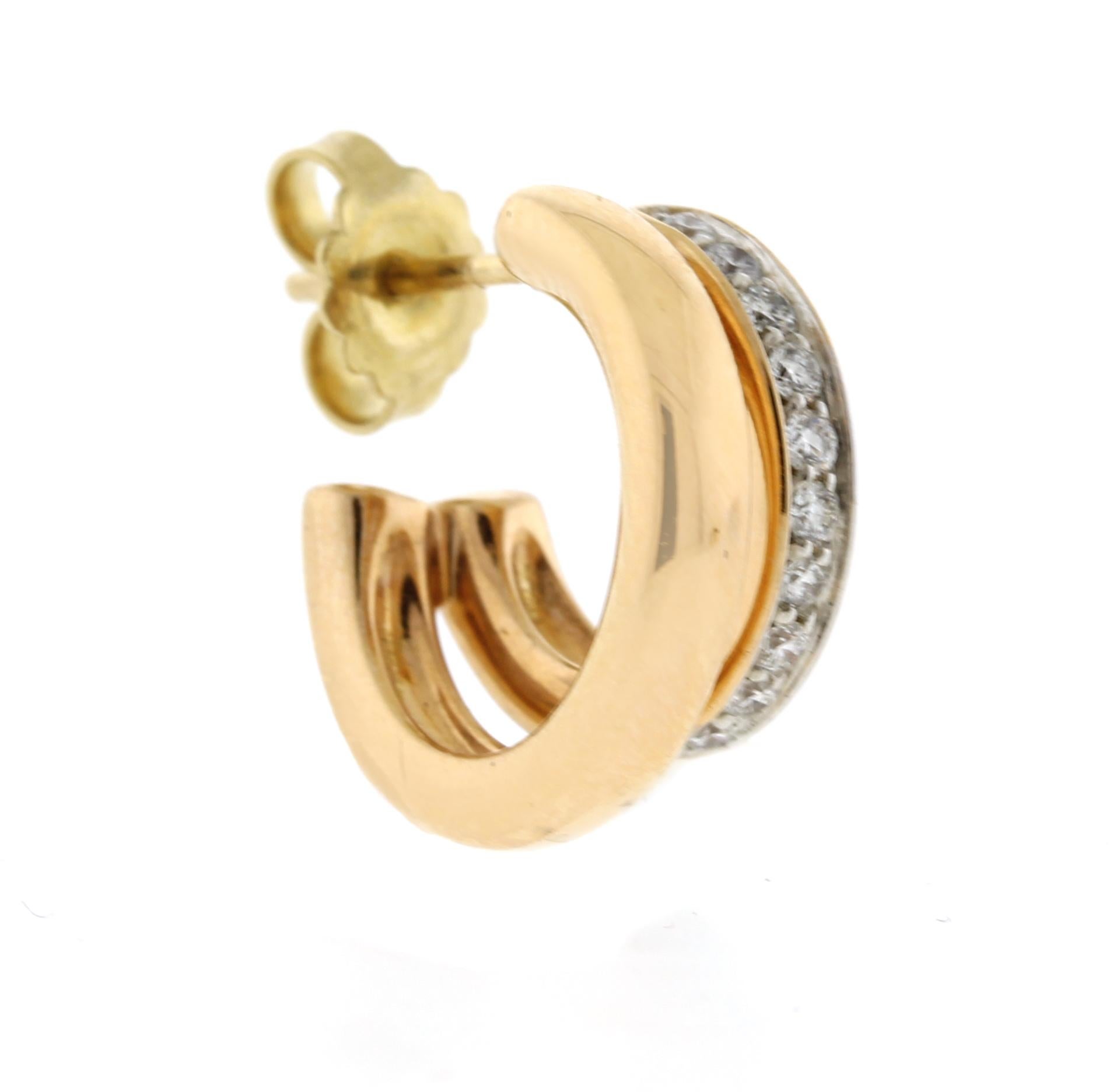 From Pomellato's, Iconica collection; a double hoop diamond and rose gold pair of earrings. 
• Designer: Pomellato
• Metal: 18 karat rose gold
• Circa: 21st century
• Original retail $4200
• 5/8ths of an inch diameter ¼ inch wide 
•  32 round