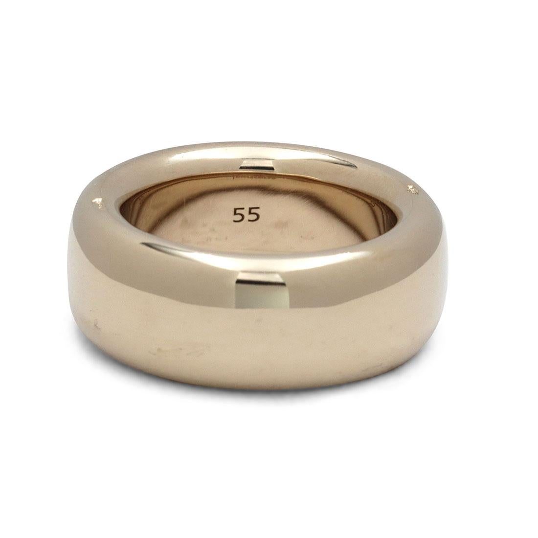 Authentic Pomellato Iconica ring crafted in 18 karat yellow gold. Designed as a band, this  daring ring features a smooth rounded finish. Signed Pomellato, 55, with serial number. Ring size 55 (7 1/4 US). This ring is not presented with the original