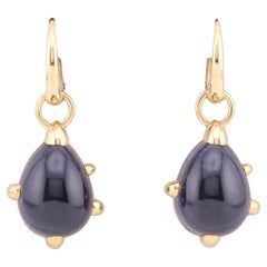 Orecchini pendenti in oro giallo 18k con iolite di Pomellato