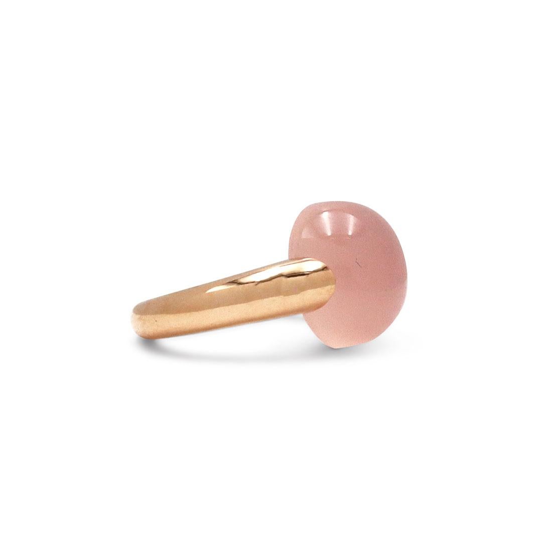 Authentic Pomellato 'Luna' ring crafted in 18 karat rose gold. Centering on a pearly opalescent quartz stone, the color and soft curve of the ring is truly reminiscent of the moon. Signed Pomellato, 750, with Italian hallmark and serial number. Ring