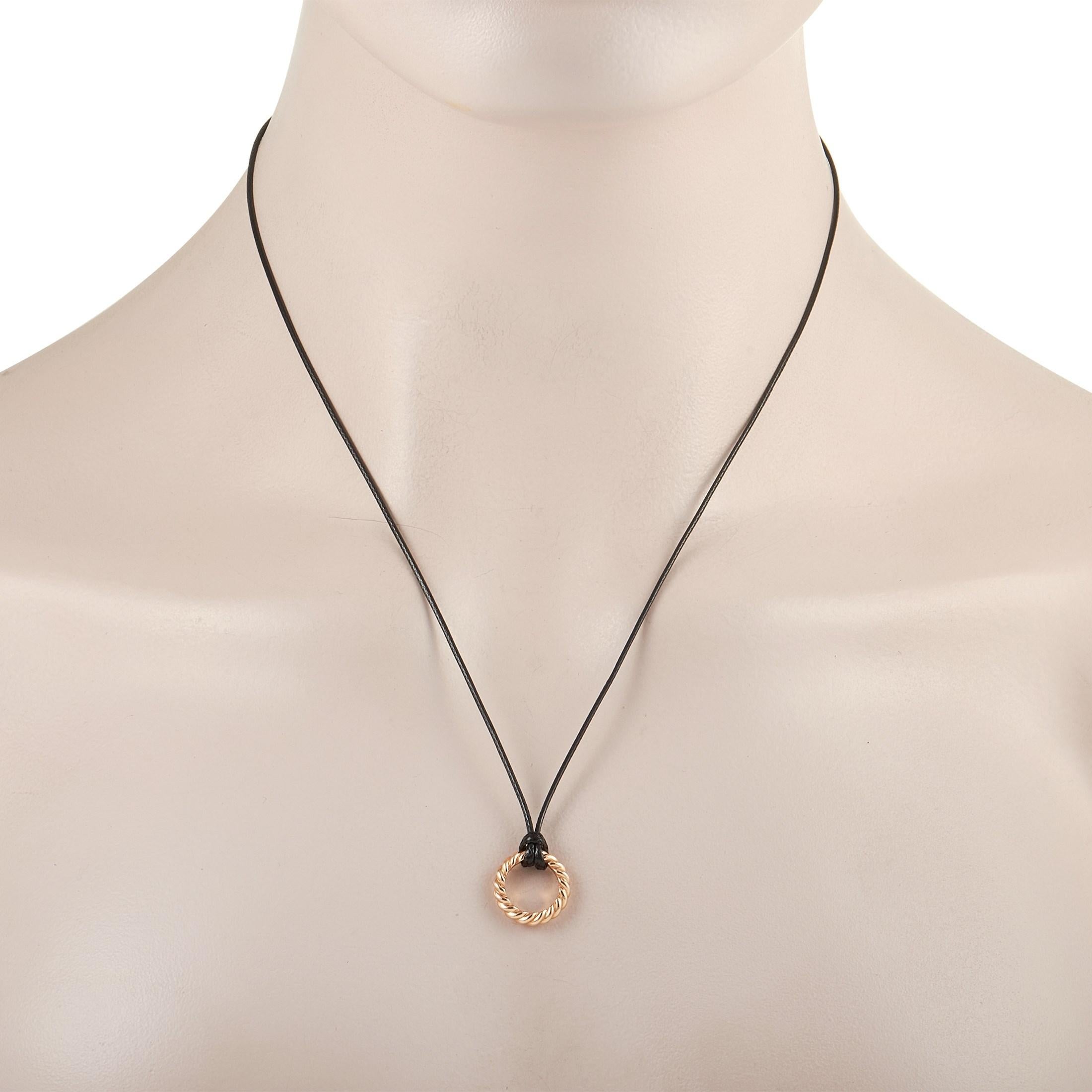 This pretty Pomellato Milano 18K Rose Gold Circle Pendant Necklace is made with a black cord measuring 24 inches and featuring a braided hollow circle pendant made from 18K rose gold. The pendant measures 0.50 inches in length by 0.50 inches in
