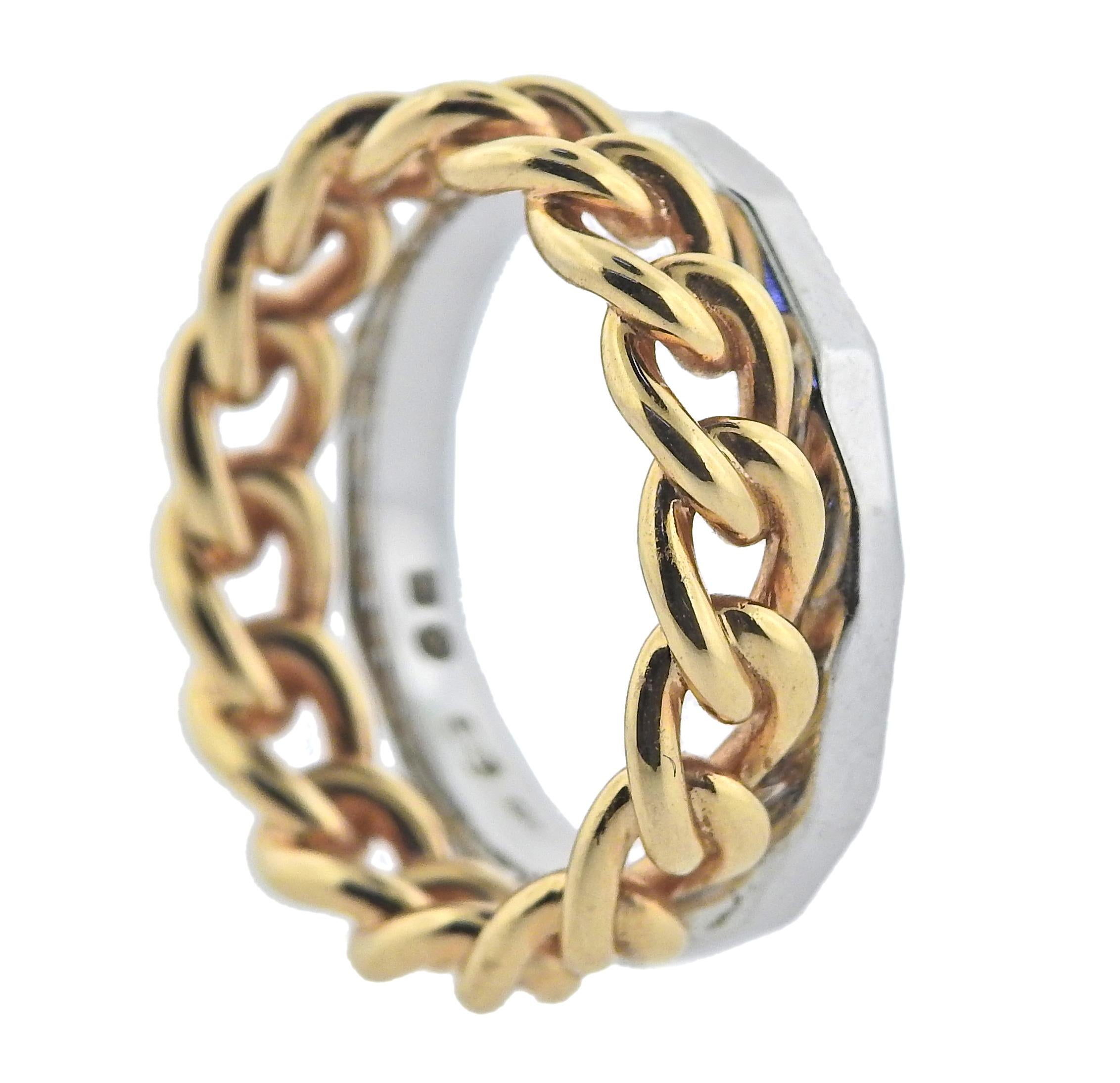 Pomellato 18k rose and white gold cuban link band ring made for Milano collection. Ring size 6 3/4 and it is 8.2mm wide. Marked: 750, Italian gold marks, Pomellato, Milano. Weight is 9.98 grams. 