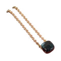 Coffret comprenant un collier Pomellato Nudo en or rose 18 carats avec pendentif en topaze bleue de Londres