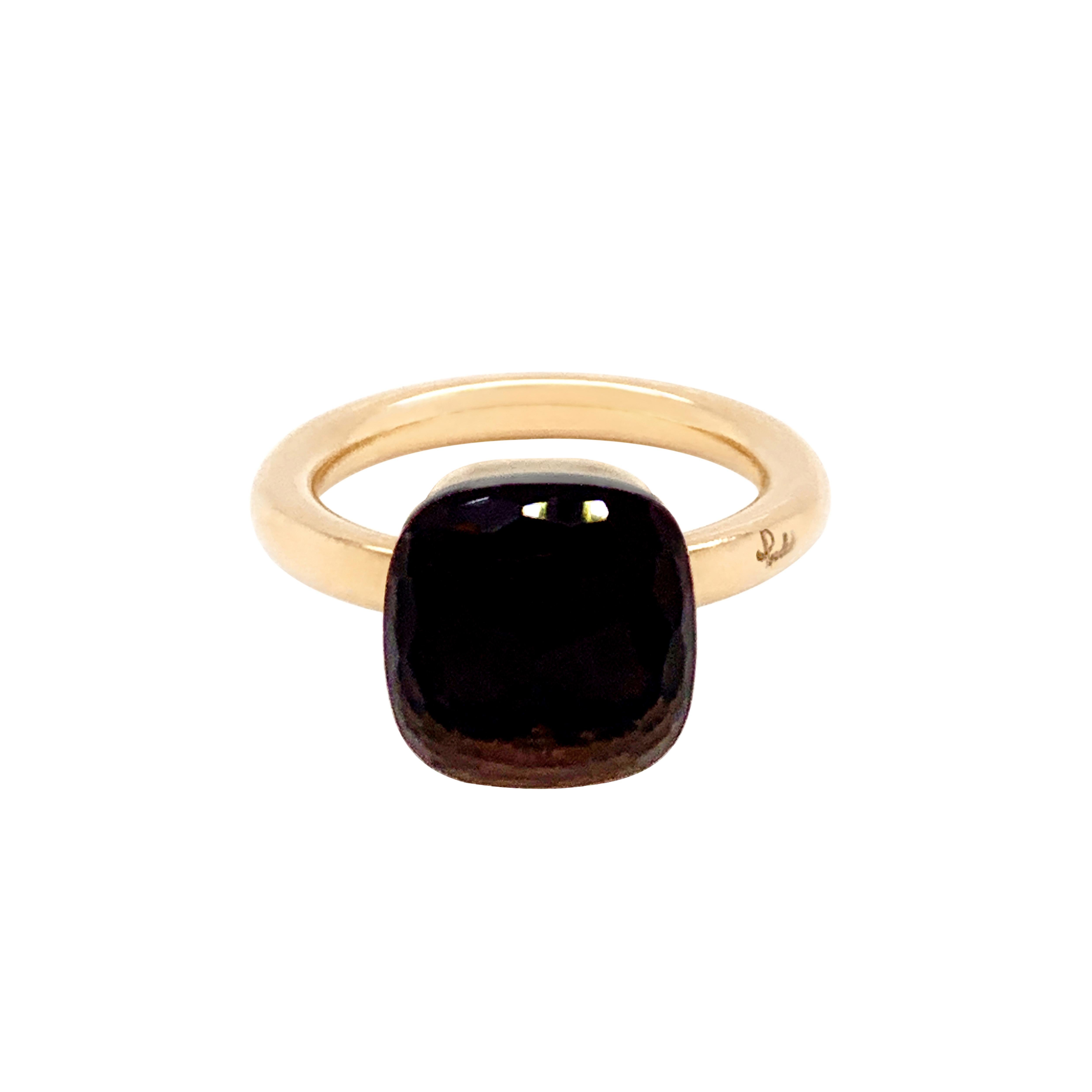 From the classic Pomellato 'Nudo' collection, a beautiful Smokey quartz measuring approximately 10mm x 10mm and weighs approximately 5.00 carat mounted in 18 carat rose gold. The ring features the classic Pomellato signature and hallmarks. UK finger