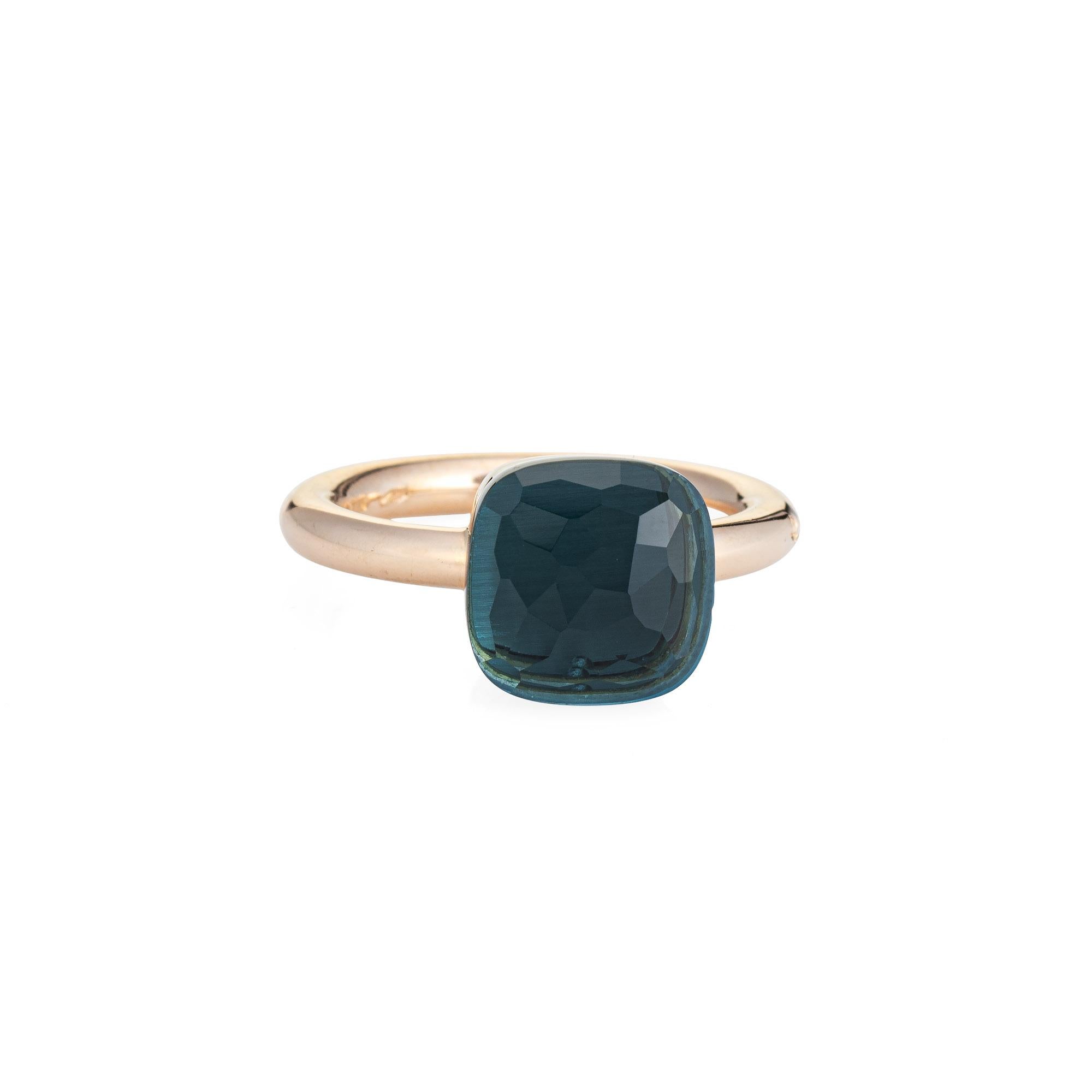 Finely detailed estate Pomellato London blue topaz Nudo ring, crafted in 18 karat yellow gold. 

Faceted London blue topaz measures 10.5mm x 10.5mm. The topaz is in good condition with a small chip evident under a 10x loupe.   

The ring is in good