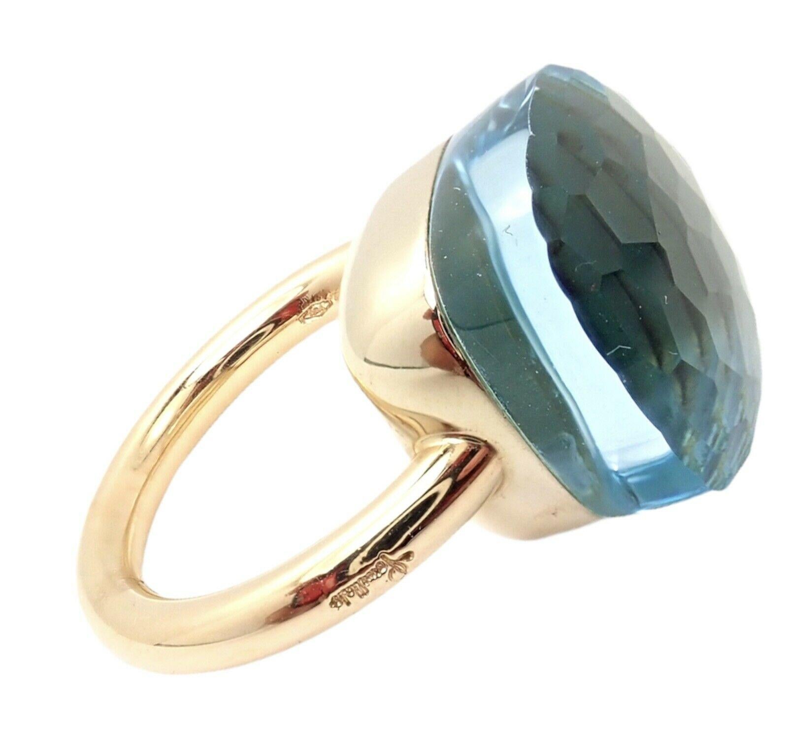 18k Yellow Gold Nudo Maxi Large Size Blue Topaz Ring by Pomellato. 
With 1 large blue topaz stone 16mm x 16mm.
Details:
Size: European 52, US 6
Width: 16mm
Weight: 16 grams
Stamped Hallmarks:  Pomellato 750 52
*Free Shipping within the United