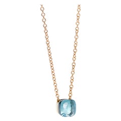 Pendentif Nudo Pomellato avec topaze bleue et chaîne en or rose 18 carats