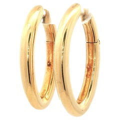 Orecchini a cerchio ovale Pomellato in oro giallo 18 carati, moderni e a goccia