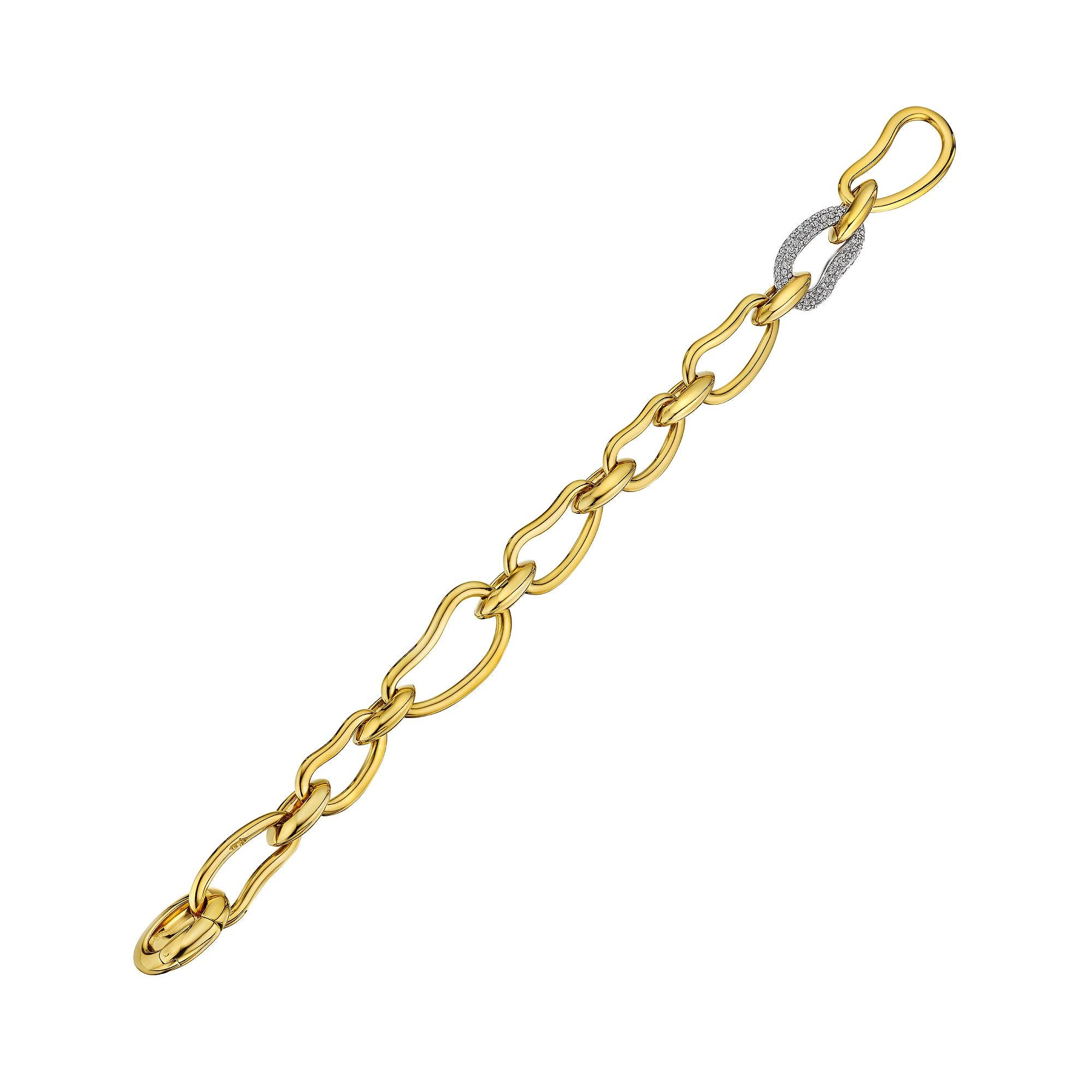 With an organically shaped paisley link design, this modernist Pomellato 18 karat yellow gold and diamond bracelet is mesmeric.  Signed Pomellato.  Circa 2008.  Total diamond weight .85 carats.  8
