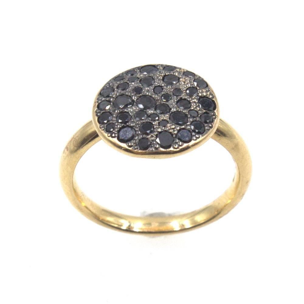 This popular diamond ring by Pomellato features 1.00 carat of black diamonds set in a pave fashion. The ring is crafted in 18 karat rose gold, and is currently size 6. The ring can be worn alone or stacked with other rings. I have two other similar