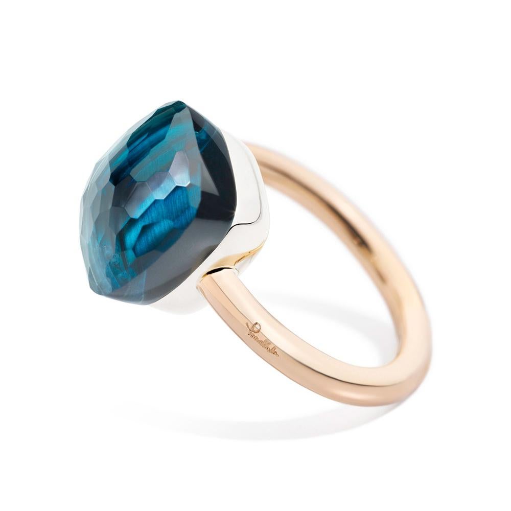 Nudo Maxi, the largest Nudo size, features an eye-catching gem carved in the most iconic design of the Maison. Pomellato Nudo Maxi ring in yellow gold 18k decorated with a London blue topaz.

Details:
Size EU: 49 
Size US: 5
Width: 16mm 
Total