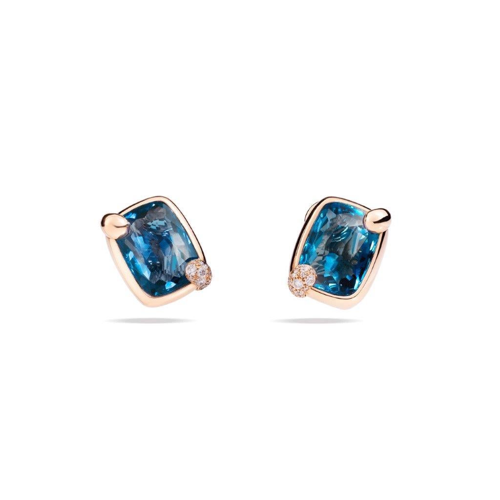 These earrings with a curved design shines bright, enhanced by london blue topaz gemstones 16ctw. and a diamond-covered prong. 18k rose gold. Diamonds .31ctw.