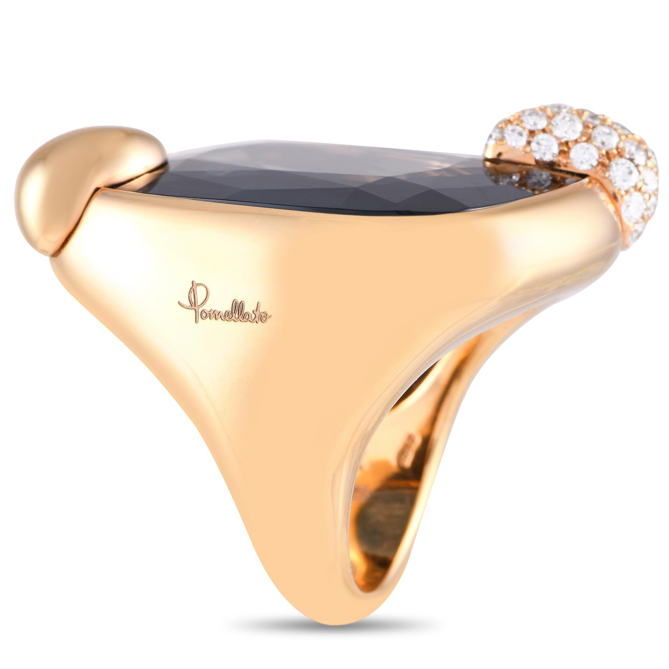 An enchanting London Blue Topaz gemstone makes a statement at the center of this impeccably crafted Pomellato Ritratto ring. Sparkling Diamond accents totaling 0.53 carats elevate the minimalist design. This 18K Yellow Gold piece features a 5mm wide