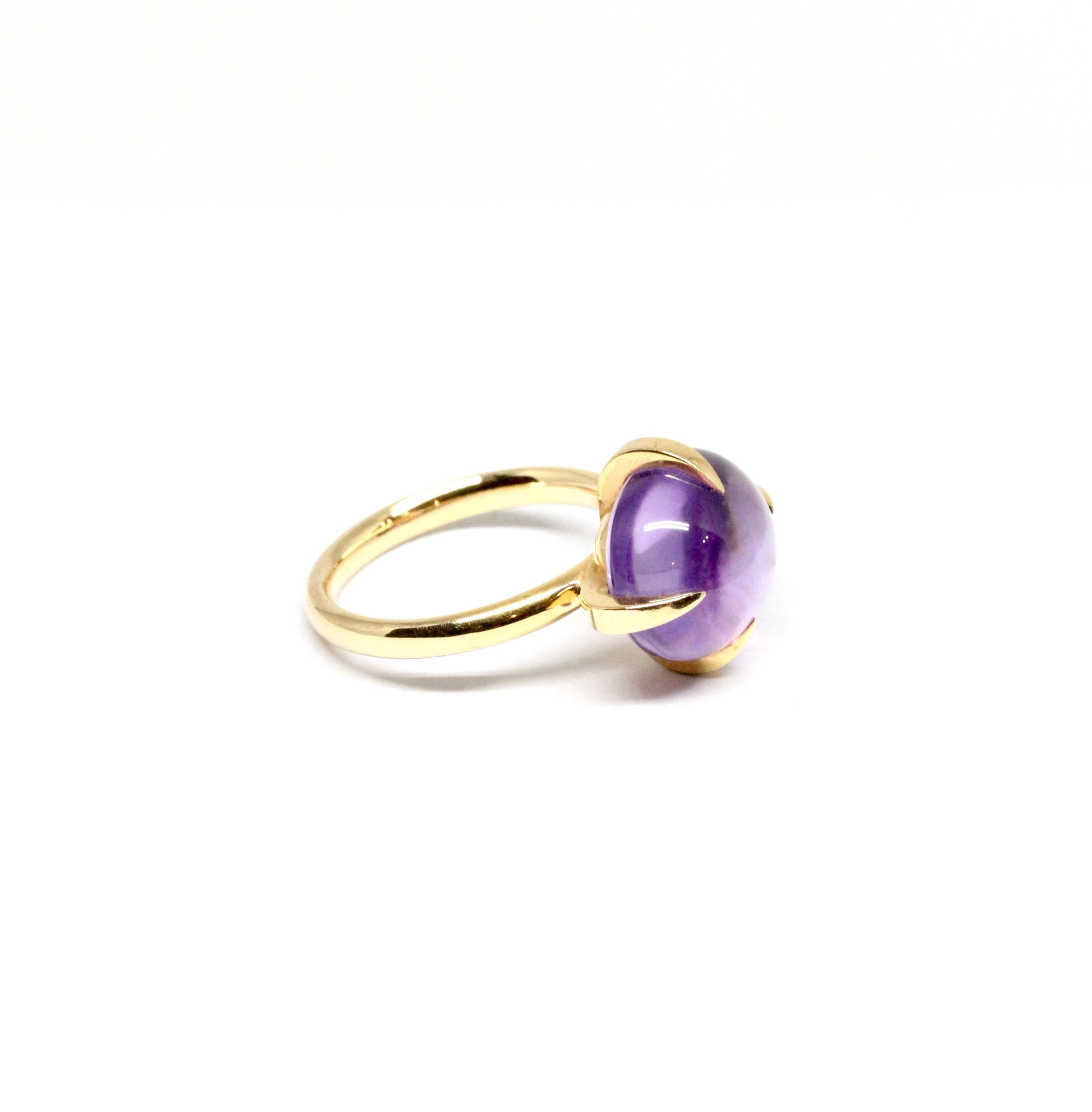 This pre-owned stunning elegant Pomellato ring from the Veleno collection features a cabochon cut amethyst gemstone supported by four golden prongs set in 18k rose gold.

Estimated ring weight: 6.6 grams
Ring size: 52
