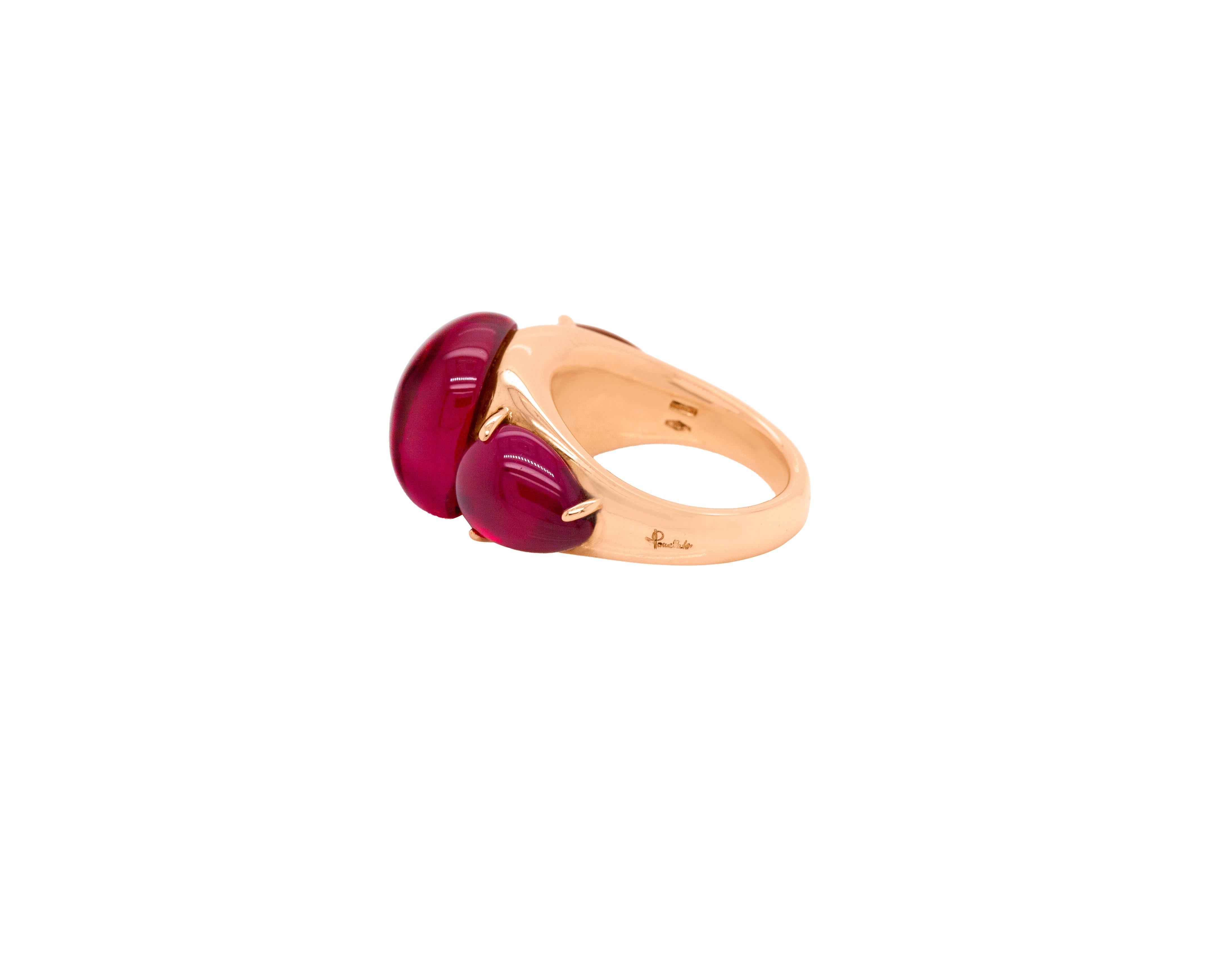 This stunning piece by Pomellato really is out of this world. 
Part of the iconic 'Rouge Passion' Collection, this captivating cocktail ring is adorned with a fabulous trio of cabochon red stones in a warm lively red hue, just like the juicy and