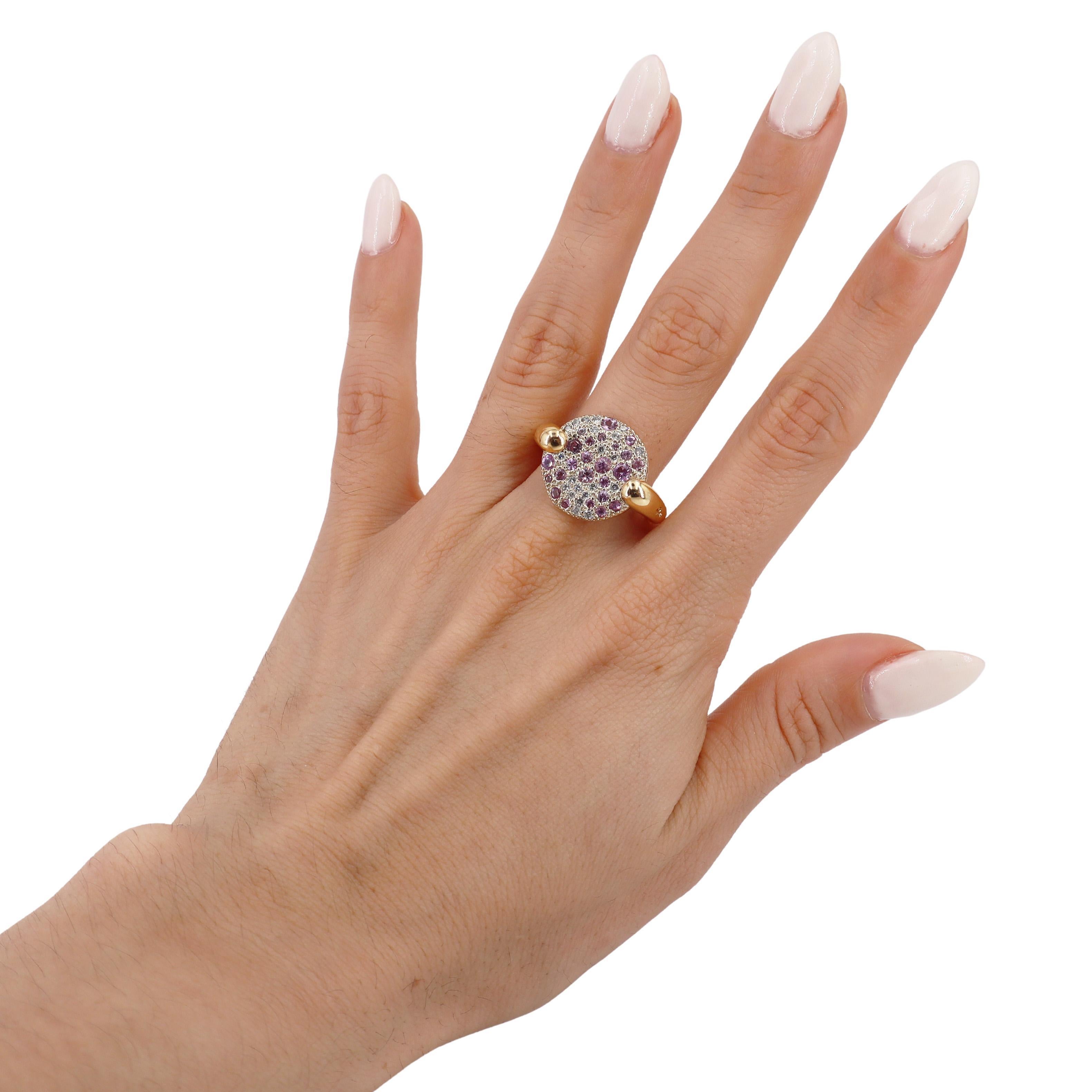 Introducing the exquisite Signed Pomellato Sabbia Ring, a true masterpiece of craftsmanship crafted in 18kt yellow gold. This stunning ring showcases a luxurious pavé of round cut diamonds, which collectively weigh approximately 0.20 carats. With