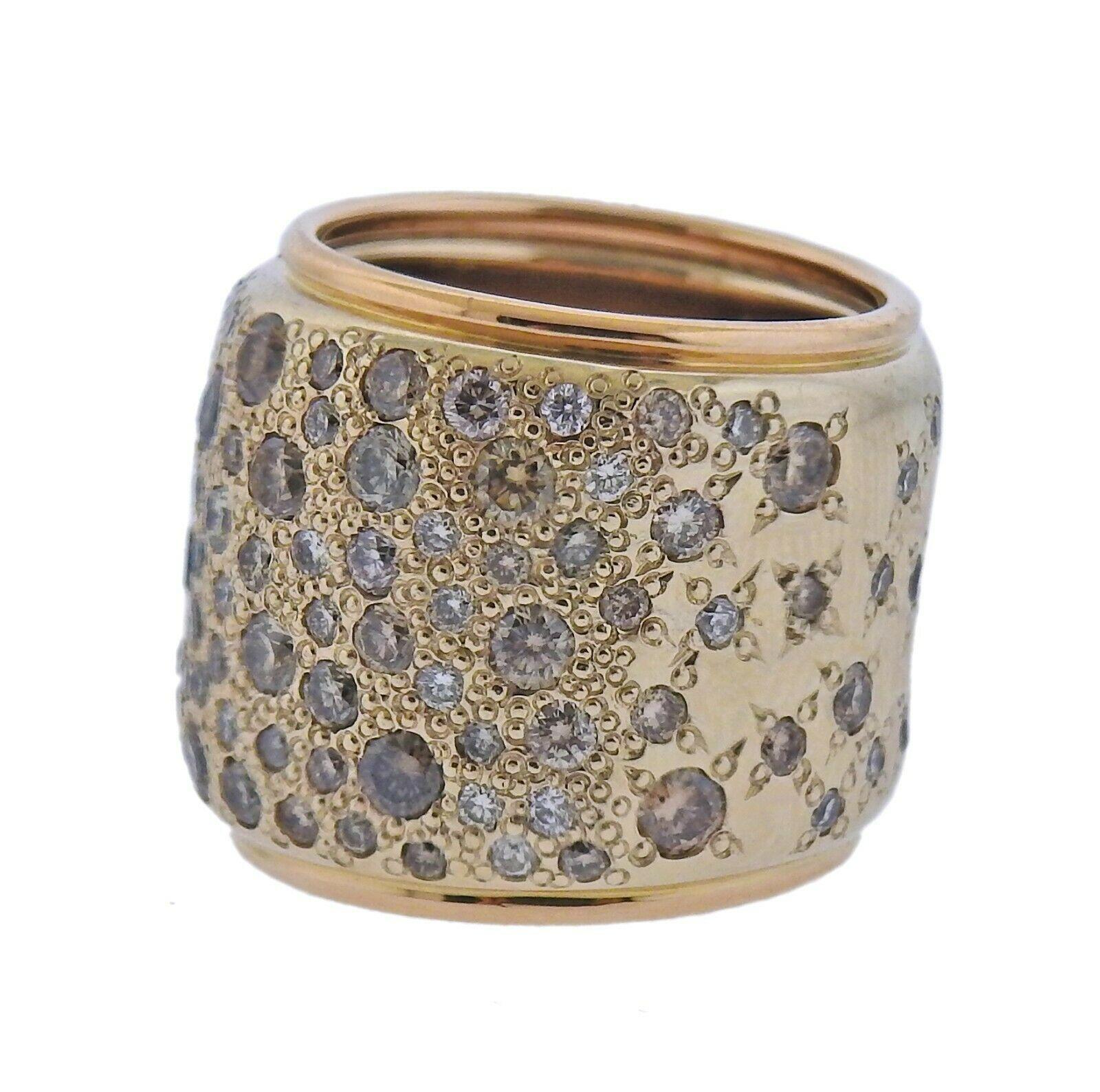 Iconic Sabbia 18k wide band ring by Pomellato, with approx. 3.32cts in fancy diamonds.   Ring size - 5.25, ring is 18mm wide.   Weight - 29.1 grams. Marked: Pomellato, 750, Italian mark.