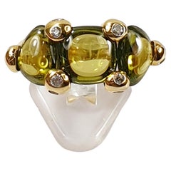 Pomellato Sassi Ring in Yellow Gold and Peridot Cabouchons and Diamonds