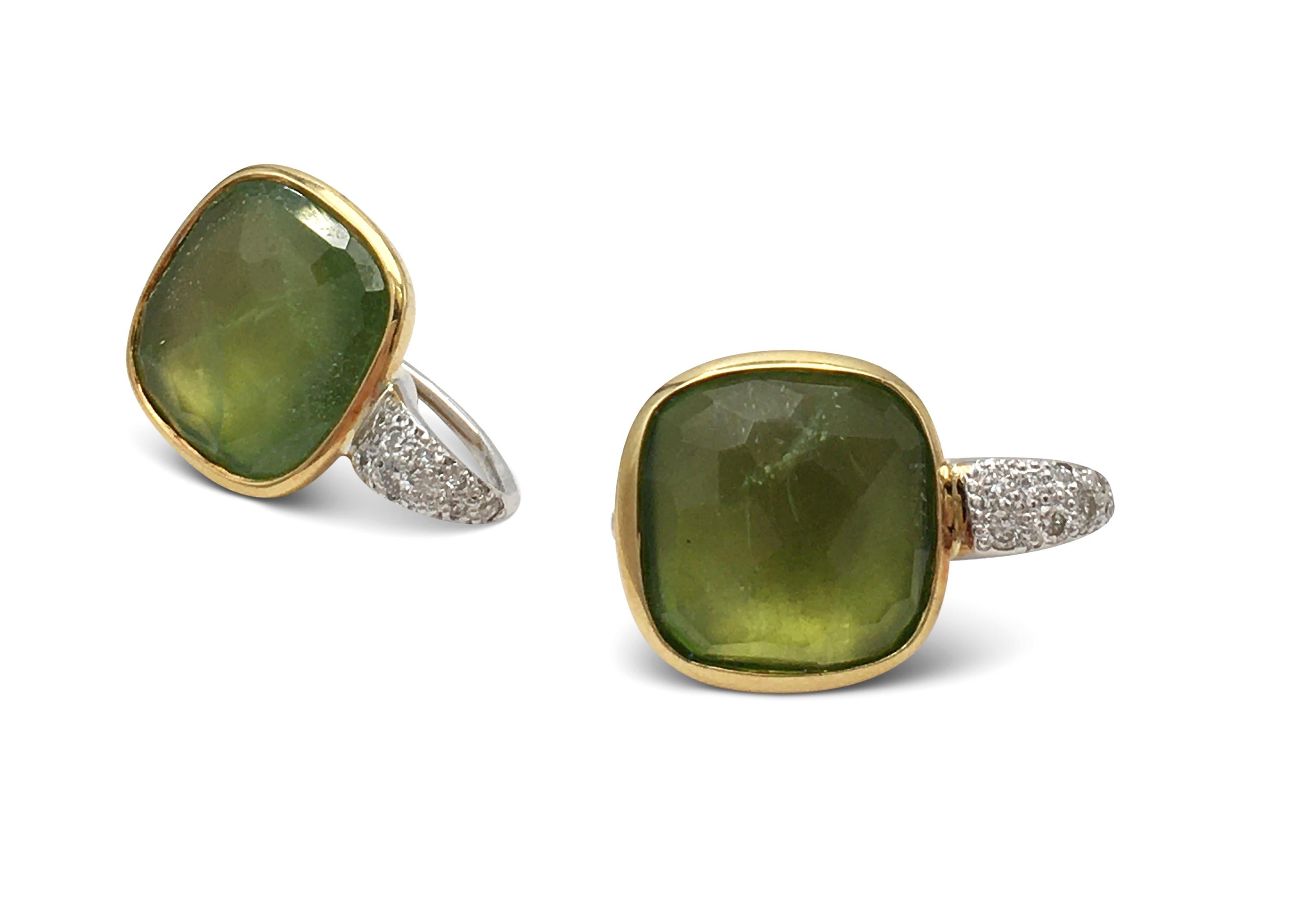 Authentique boucles d'oreilles 'Sherazade' de Pomellato en or 18 carats:: avec des péridots sertis en biseau et des diamants ronds de haute qualité pesant environ 0::15 carats de diamants ronds de taille brillant.  Signé Pomellato:: 750:: avec