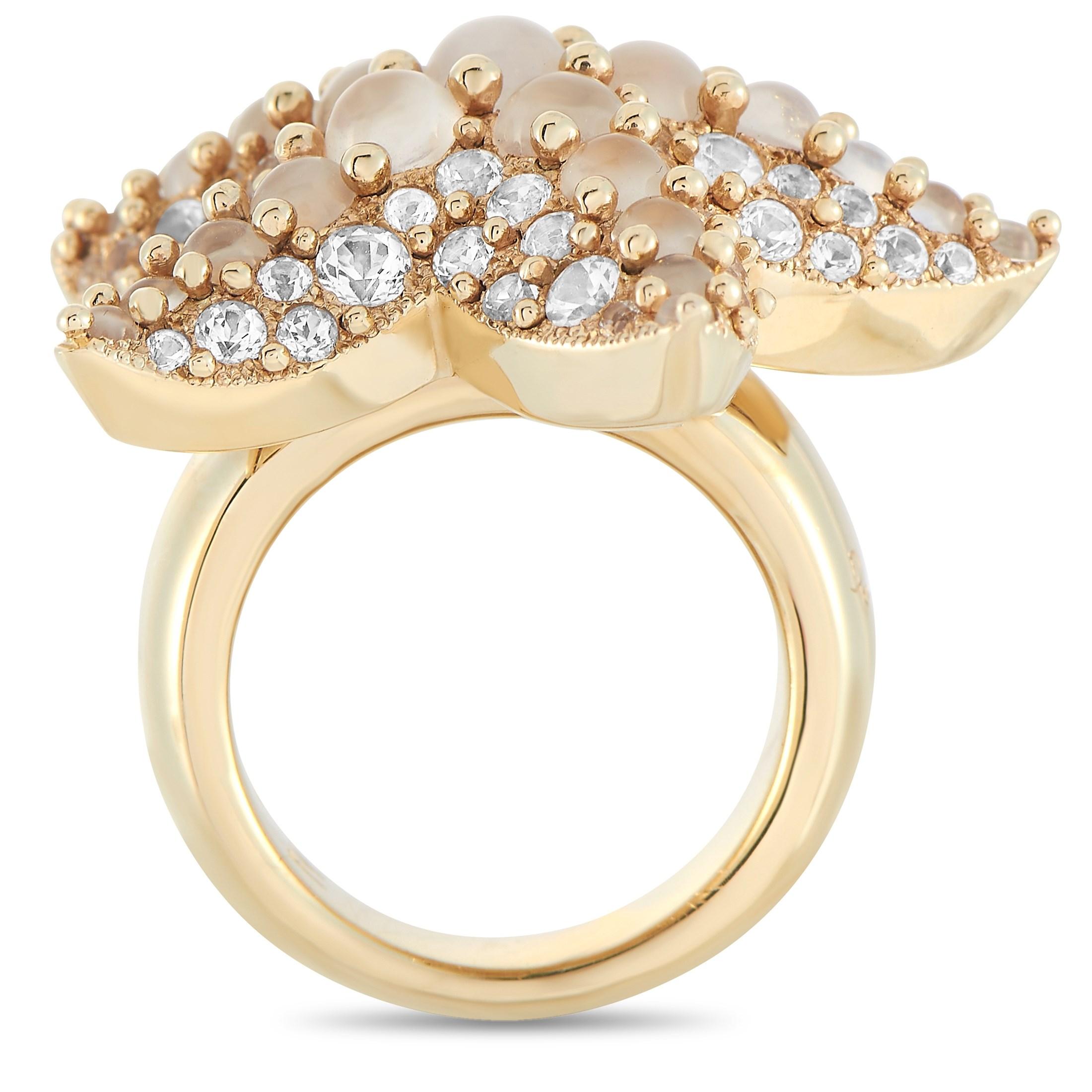 Make a beach babe's wish come true with this Pomellato Sirene 18K Yellow Gold Moonstone and Topaz Starfish Ring. This captivating ring features a 6mm yellow gold band topped with a starfish centerpiece dotted with moonstone and topaz gemstones. A