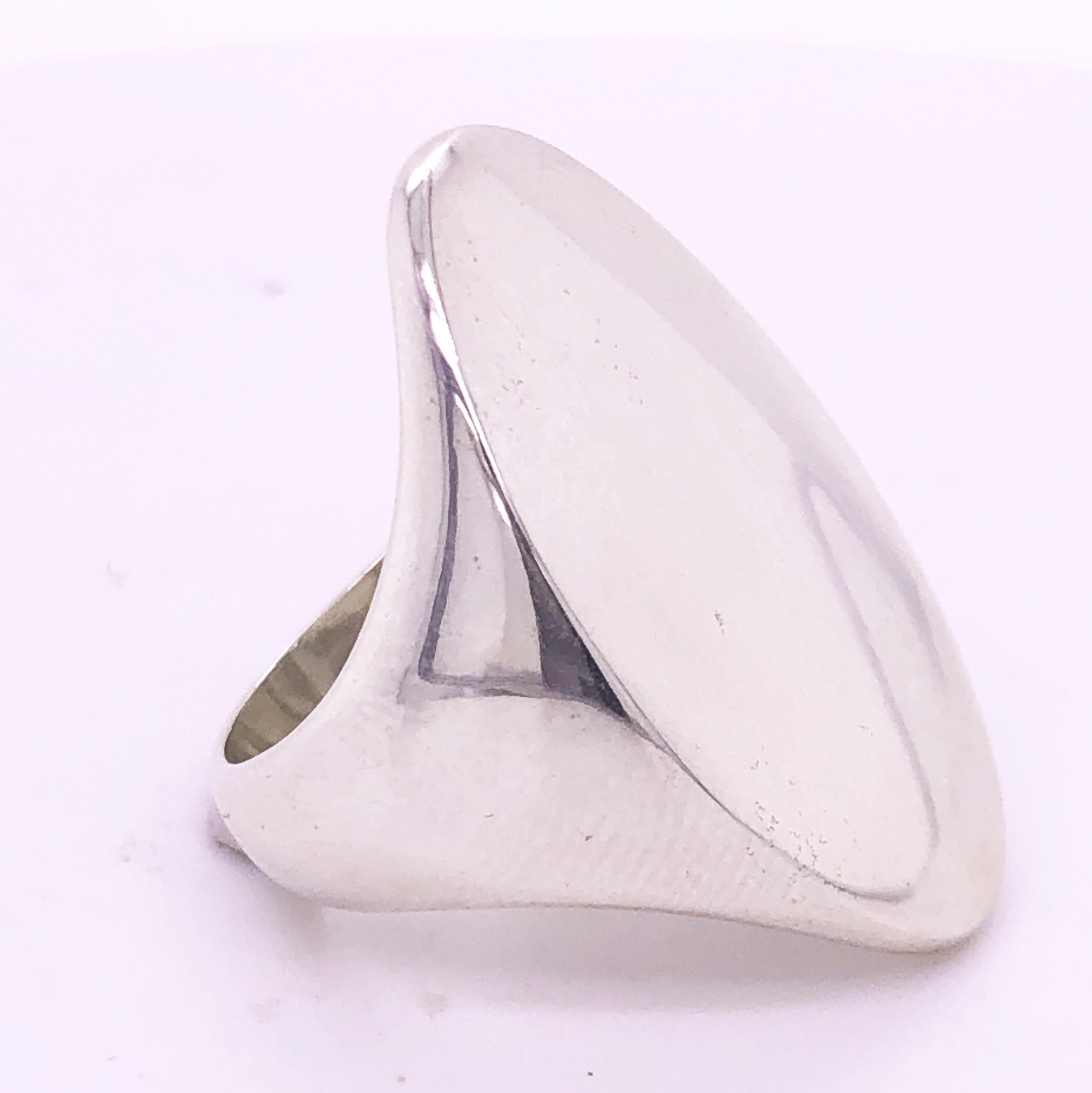 One-of-a-kind Pomellato Solid Sterling Silver, Mirror Finish, Elliptical Shaped Unusual Signet Ring. Few Pieces of this unique, very chic piece were handcrafted in Milan Pomellato Atelier.
In its original Pomellato pouch or lacquer case.
Us Size 5