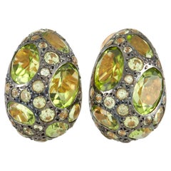 Pomellato Tabou Ohrringe aus 18k Gelbgold und grünem Peridot