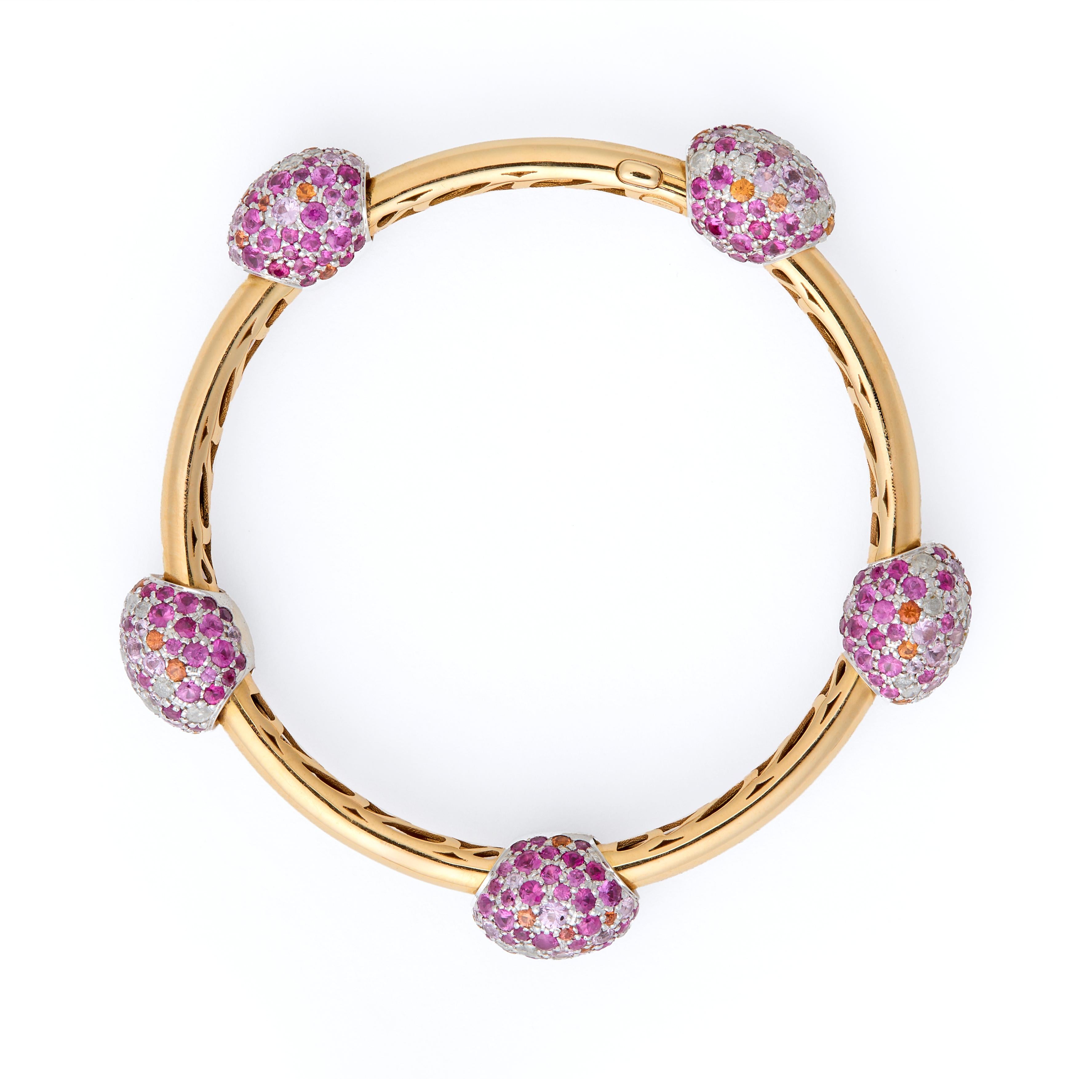 Pomellato’s Tango Collection is no longer being made by them but remains one of their most collectible and well-loved collections of all-time.

This bangle-style bracelet is 18k gold with an unexpected openwork gold design inside the bracelet and