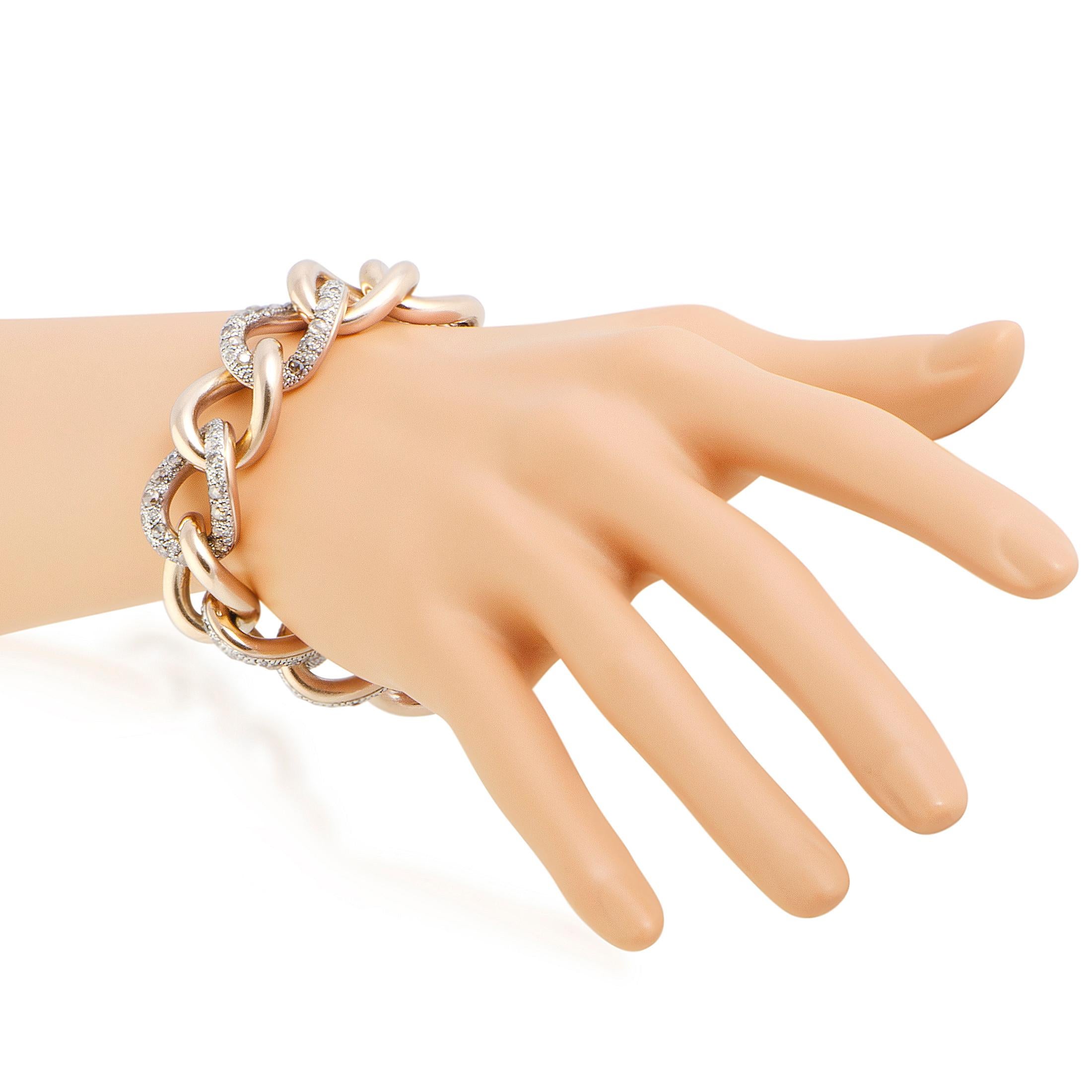 A sublime fusion of luxurious 18K yellow gold and compelling silver, this exceptional bracelet from Pomellato is embellished with exquisite champagne diamonds for a final look of absolute sophistication. The diamonds weigh 8.72 carats in