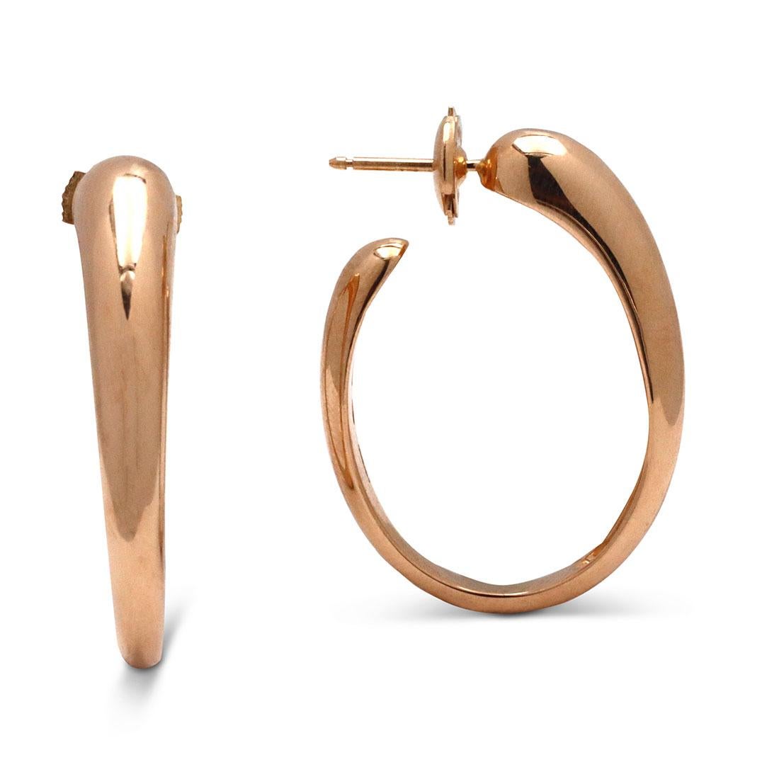 Authentic Pomellato 'Tango' earrings crafted in high polished 18 karat rose gold. The elegant curve of these earrings is inspired by the passionate, walking embrace of the Tango. The earrings measure 33.8 mm in length and 25.7mm at the widest point.