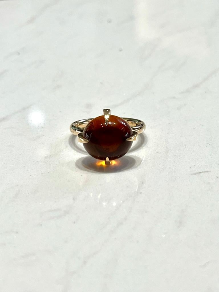Indulge in timeless elegance with the Pomellato Veleno 18K Rose Gold Citrine Ring, a radiant statement piece that seamlessly marries sophistication and charm. Crafted in luxurious 18K rose gold, this exquisite ring is an embodiment of impeccable