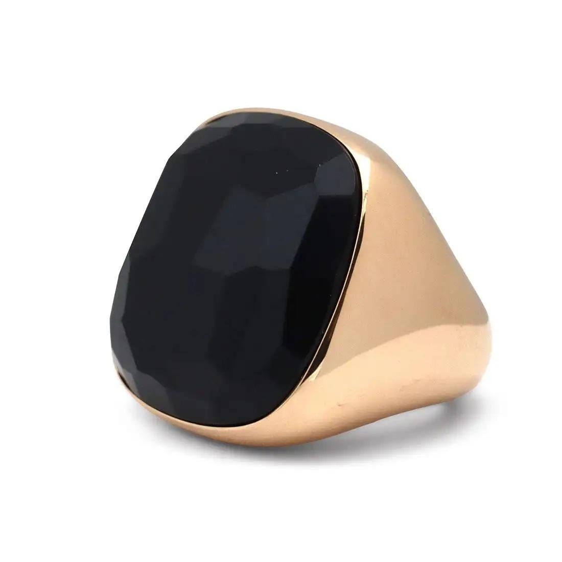 Authentic Pomellato 'Victoria' ring crafted in high polished 18 karat gold and set with a large, faceted jet measuring approximately 25.6mm x 25.6mm. Signed Pomellato, 750, with Italian hallmark. Ring is presented without the original box and