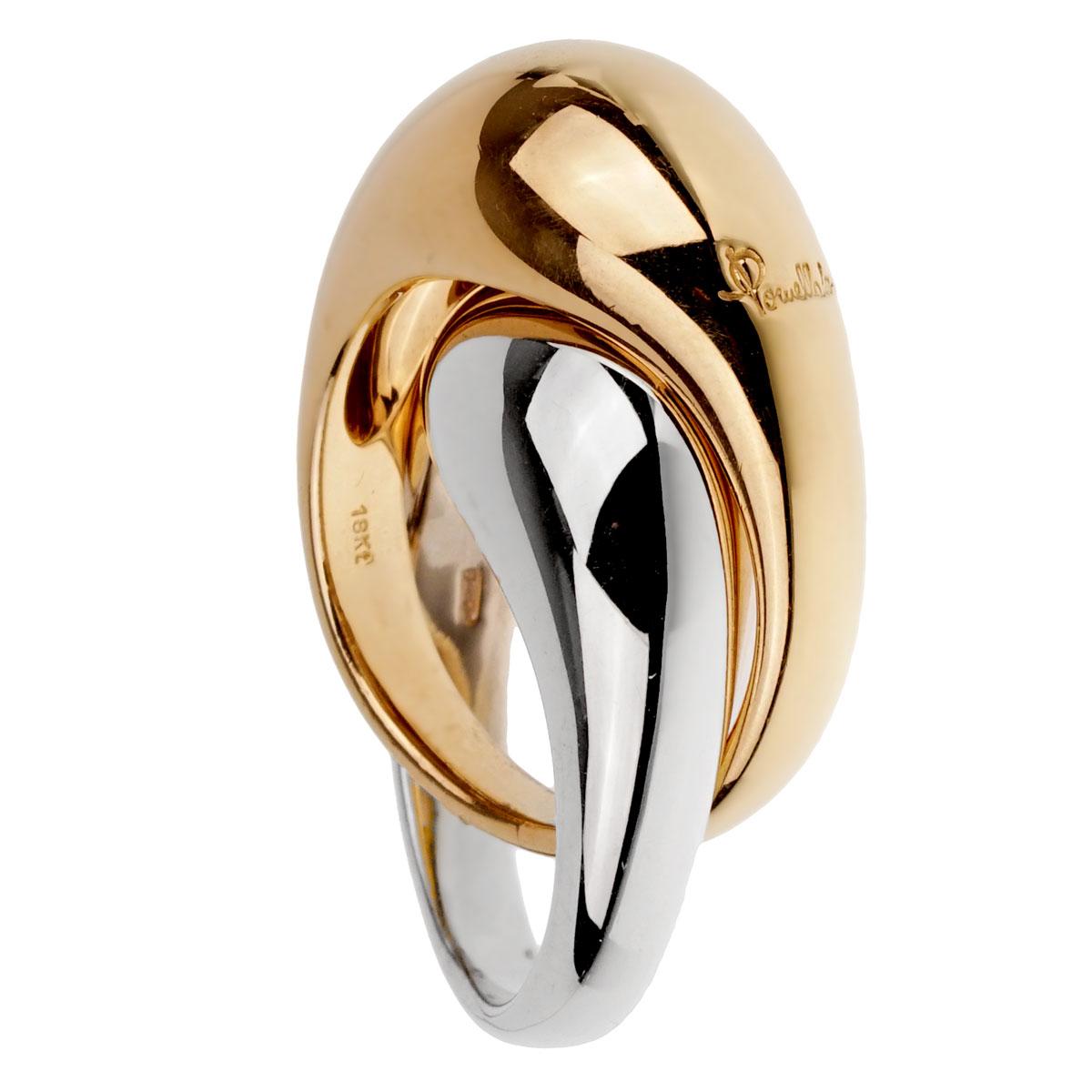 Two smooth gold rings come together to form one stunning piece in the two tone gold cocktail ring from Pomellato. High polished yellow and white gold puffed, rounded bands sit alongside each other for a more substantial look. The width of each