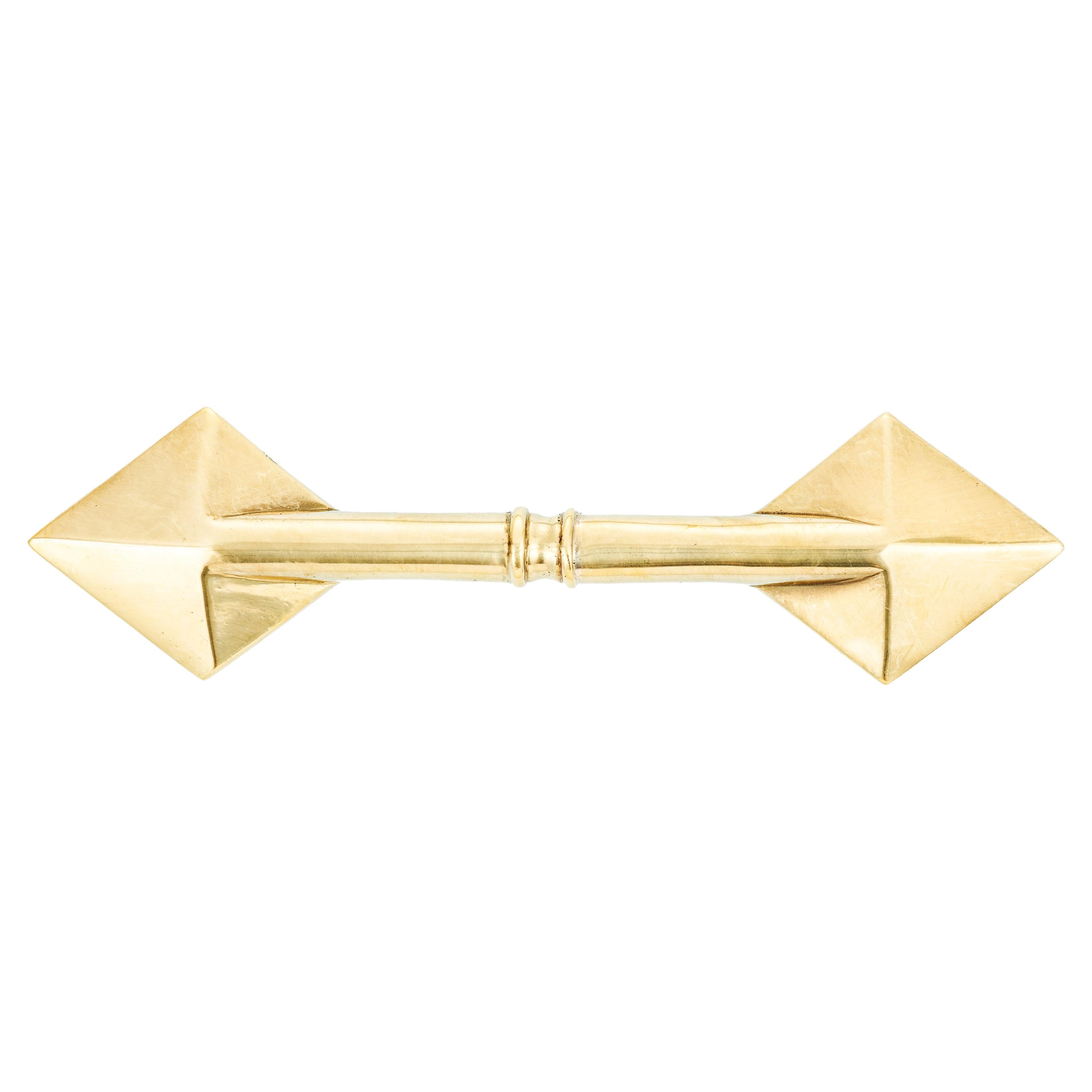Contemporary brass knob with diamond-shaped stand