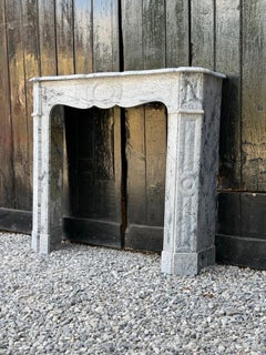 Pompadour-style fireplace in blue turquin marble around 1880, a pair available