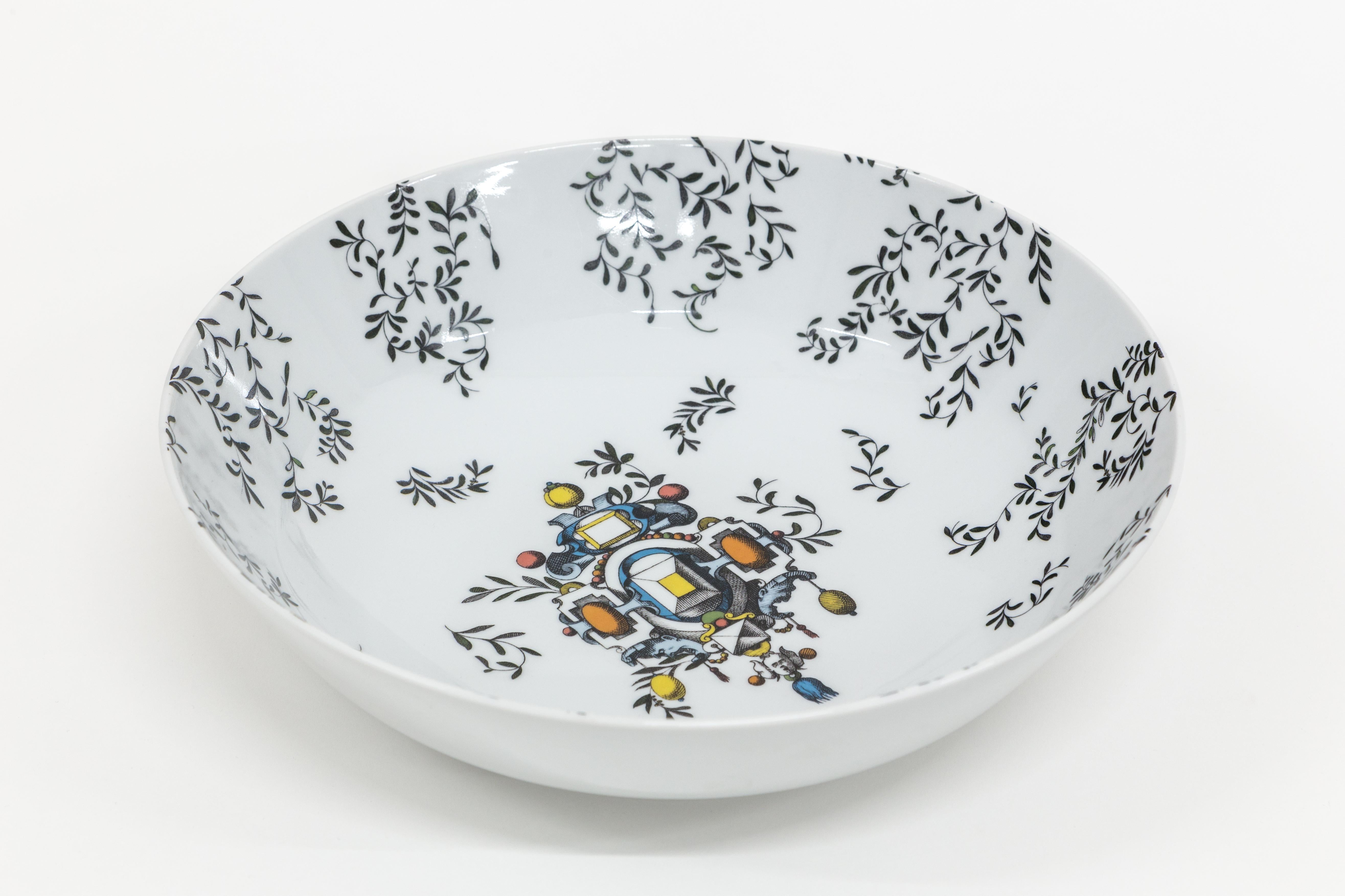 This 34cm diameter bowl is part of the Pompeii collection by Grand Tour By Vito Nesta. The very versatile shape is suitable as a fruit stand, table centerpiece or ornamental bowl on any shelf. The inner surface of this porcelain is studded with