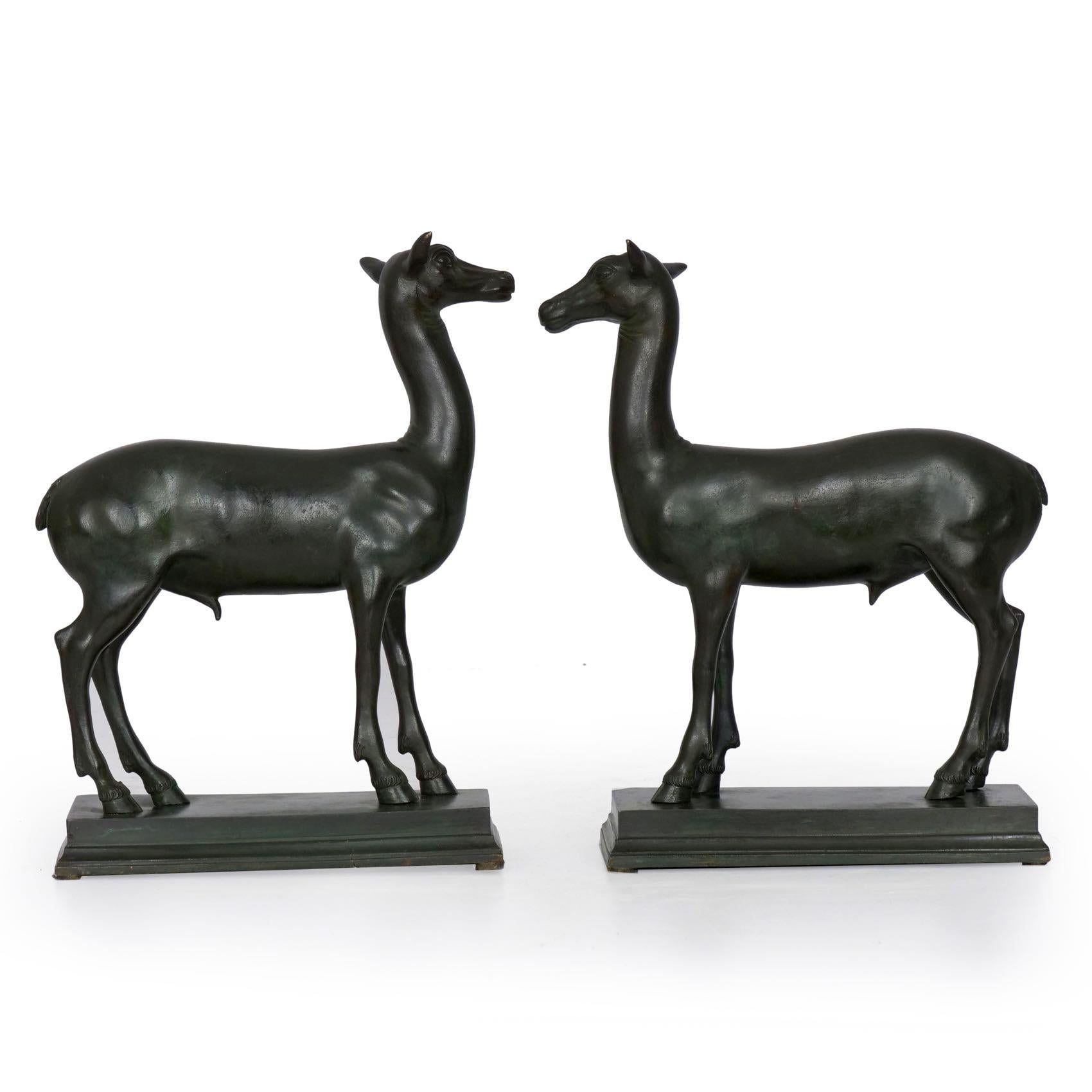 Cast in the manner of founder Sabatino de Angelis and his sons, this fine pair of bronze sculptures were derived from the figures of deer found on raised plinths in the Pompeian ruins of the Villa of Papyri. Each is expertly cast with crisply