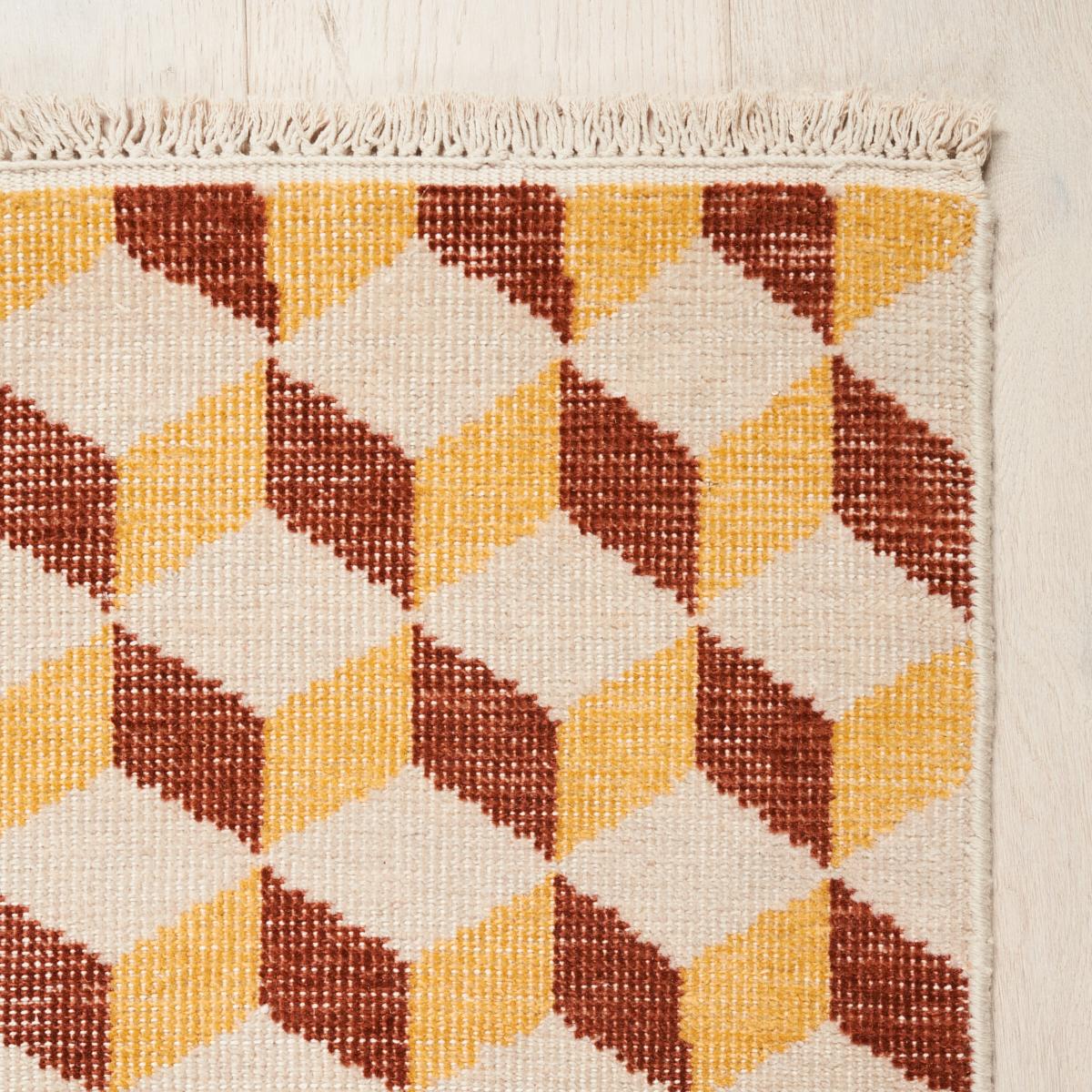 A timeless tumbling-block rug design, Pompeii features a versatile motif that is equally at home in modern and traditional interiors. With its graphic pattern, stylish fringe and soft wool pile, this hand-knotted rug looks as good as it feels.
