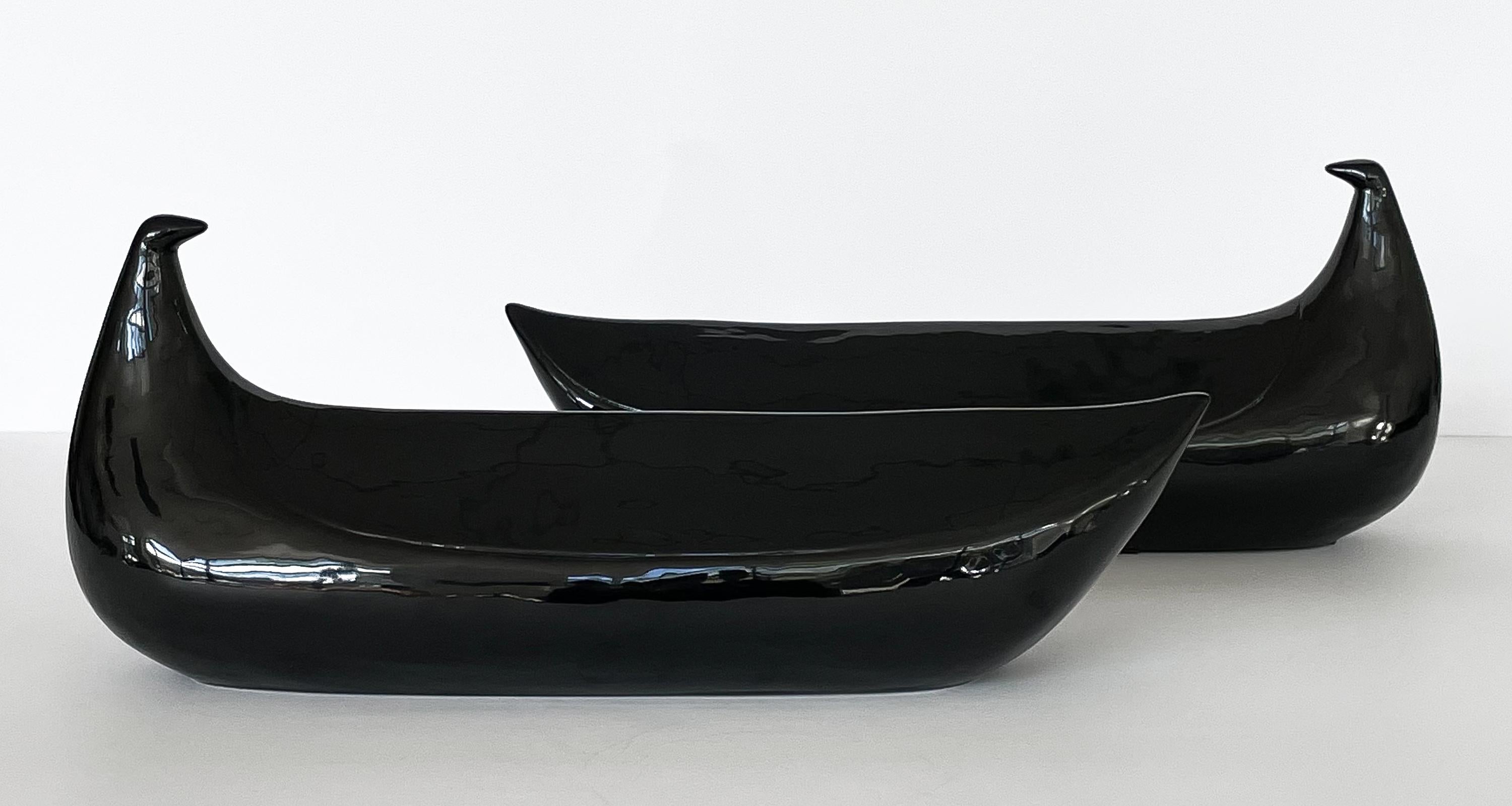 These exquisite black ceramic dove sculptures by Pompeo Pianezzola for Zanolli & Sebellin Nove, crafted in Italy during the vibrant 1960s, are a perfect blend of minimalist design and modern aesthetics. Their abstract dove shapes are rendered in a