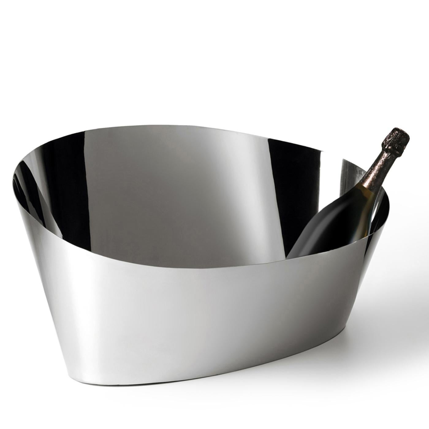 Pond is a steel champagne holder that can also be used as an ice bucket, imbuing every space with a sophisticated and timeless accent. Designed by Aldo Cibic, this piece was crafted of steel with a polished finish that plays with the surrounding