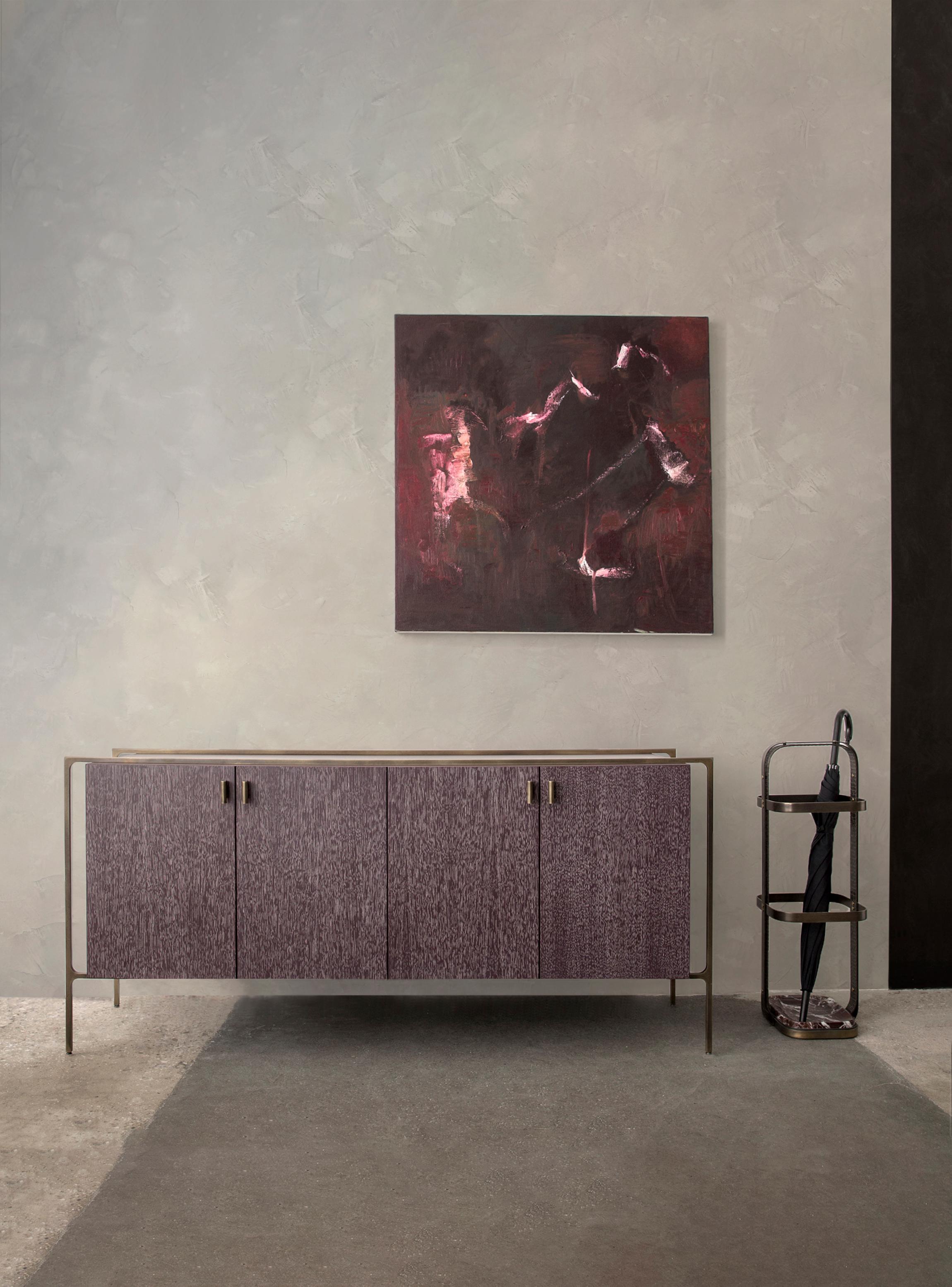Showroom floor model.

With the signature Lumifer brass 'T' component, the credenza juxtaposes a delicate brass frame with a wooden monolith.

Each of the two parts maintains its own language, materiality, and texture, making no effort to appear as
