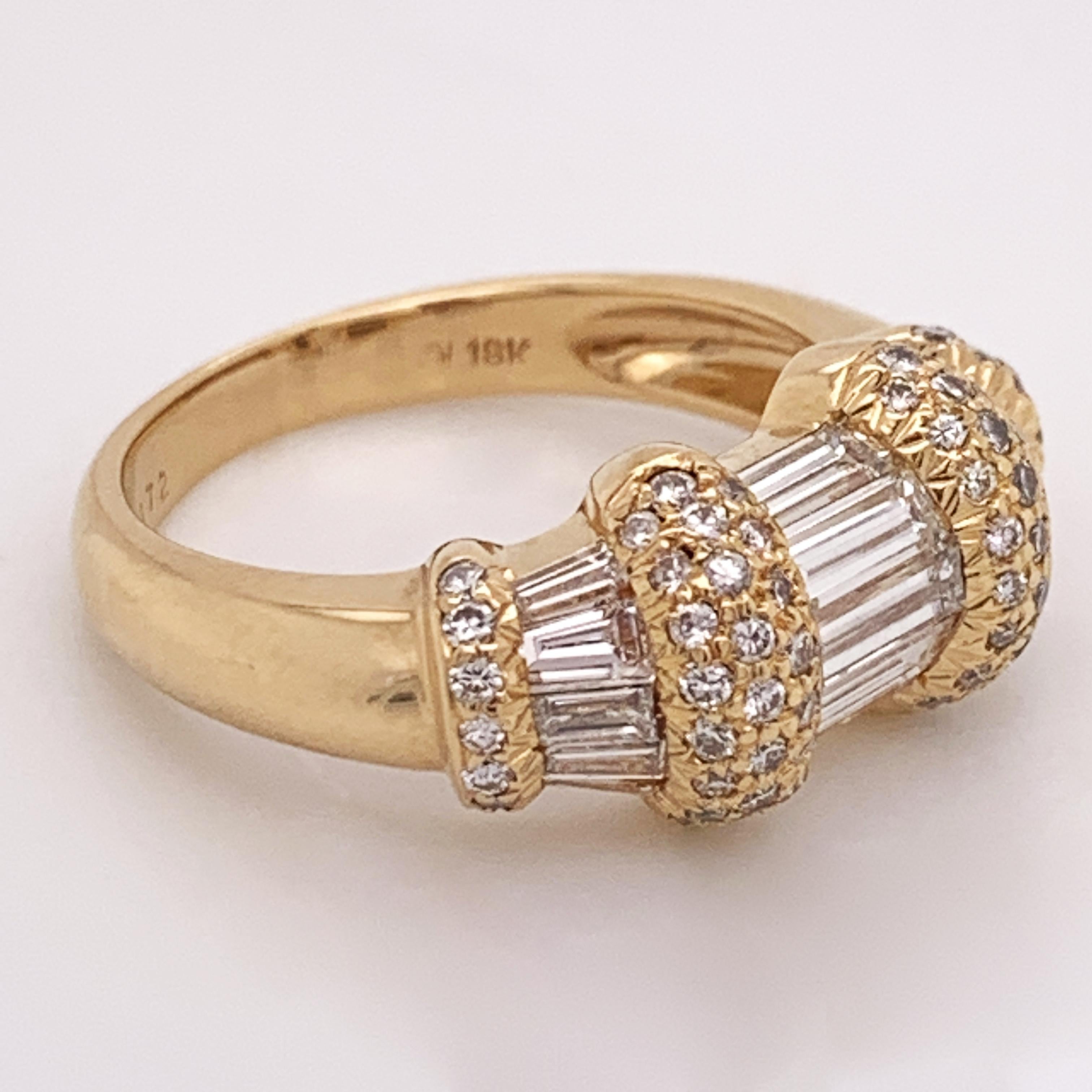 This is an exquisite example of the coveted Italian designer Ponte Vecchio style ring. It features three shapes of beautiful diamonds: round, straight baguette, and tapered baguette. The ring boasts it's brand with a small 'PV' inside the shank and