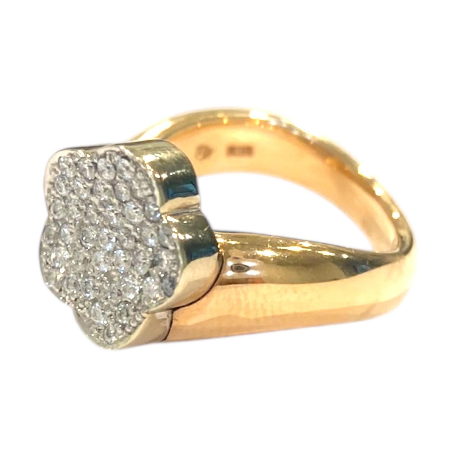 Bague vintage en or 18k de Ponte Vecchio, ornée d'une grappe de diamants taillés en brillant. Le design combine l'or rose et l'or blanc, créant ainsi un contraste saisissant. La pièce est à la fois contemporaine et audacieuse, un bijou de