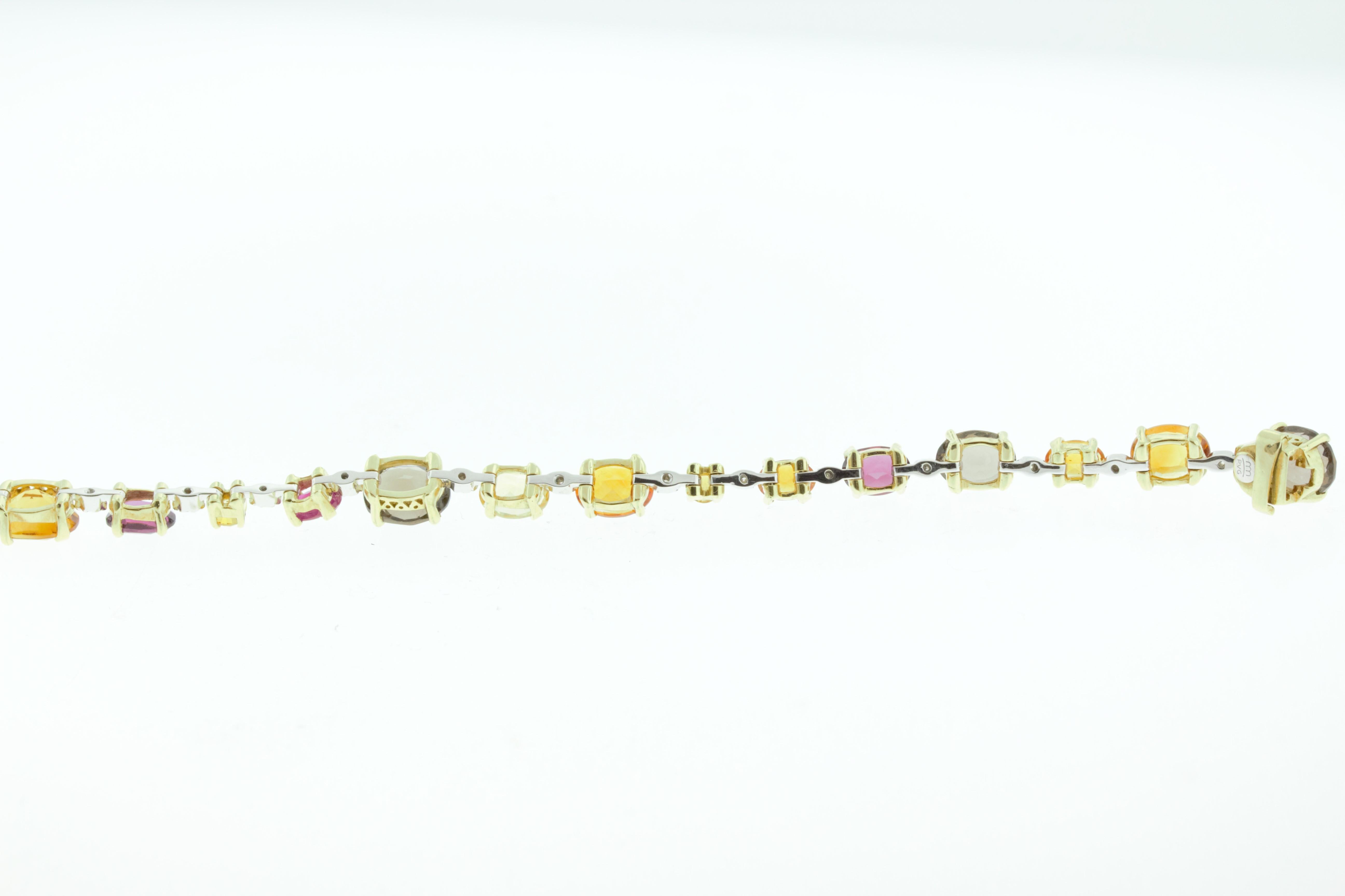 This Ponte Vecchio bracelet features 15.98 carats of sapphire, 1 carat of ruby, 0.14 carat of diamond set in 18K yellow and white gold. 14.30 grams of gold. 7 inch length. Made in Italy. 

Viewings available in our NYC showroom by appointment.